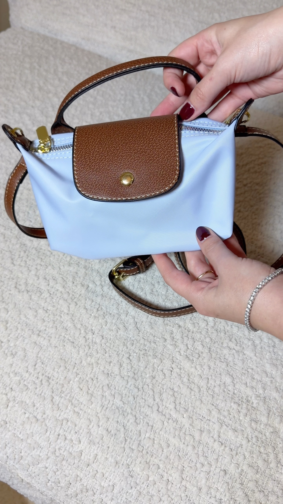 New Longchamp inspired nylon pouch for under $20! 💙
I love the pale sky blue color with the brown, so cute! It comes with holes punched in the sides and a crossbody strap you can attach


#LTKStyleTip #LTKItBag