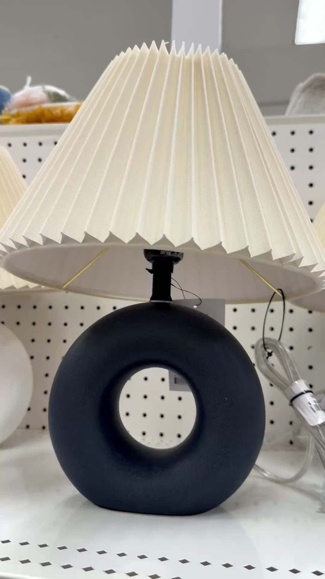 This modern-style ceramic table lamp features a round cutout design, empire-shape pleated lamp shade, and a socket turn knob. It’s perfect for an entryway, nightstand, and end table. Available in white as well.💡

And if you’re a mosaic artist, this would be a fun substrate for your tile work too! For mosaic tips, tutorials + inspiration please visit my YouTube channel: YouTube.com/julieweilbacher, and follow @julieweilbacher on Instagram.

#ceramiclamp #modernlamp #pleatedlampshade #entrywaylamp #springhomedecor #target #tablelamp #mosaic #blacktablelamp

#LTKHome