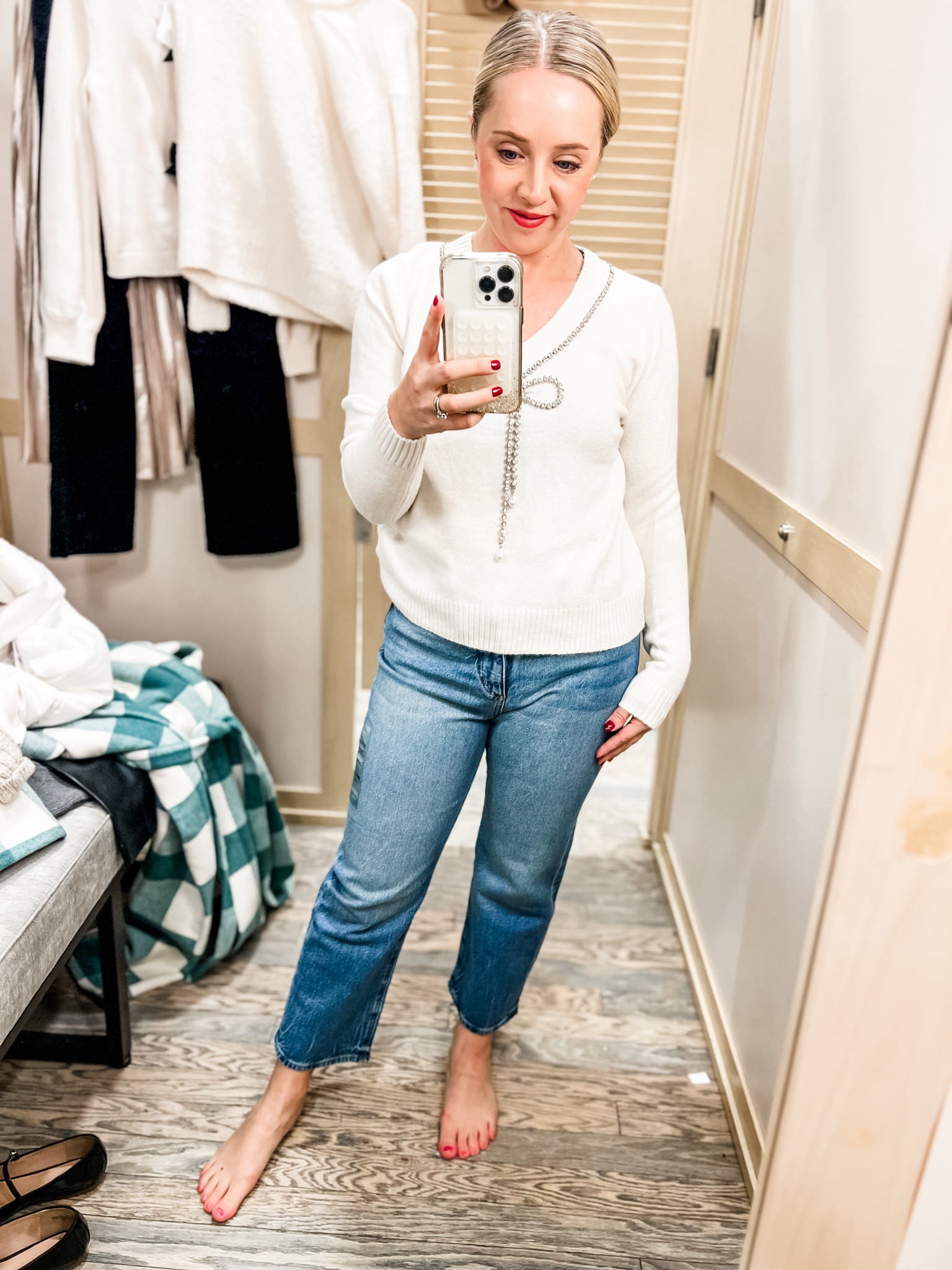 This holiday sweater is reversible and can be worn with the bow in the front or back! The small petite fit me tts and these straight jeans are also petite and fit tts (wearing 27 petite) 50% off during cyber week. 
Holiday outfit, bow sweater, embellished sweater, jeans, straight jeans, holiday sweater, reversible sweater, petite outfit 

#LTKCyberWeek #LTKSaleAlert #LTKHoliday