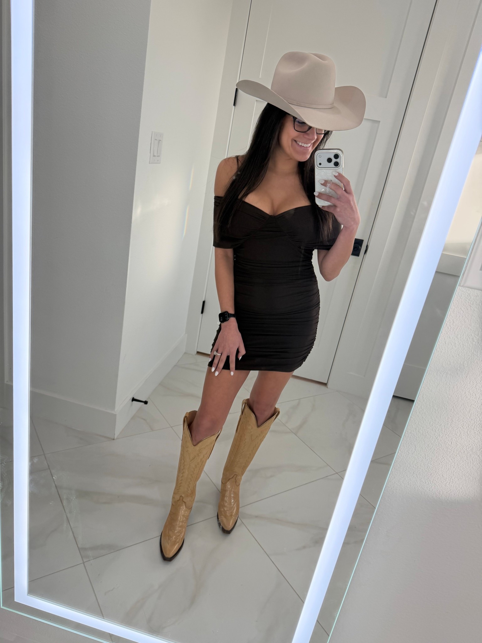 Western chic, but make it luxe 🤎🤠

Styled a chocolate brown dress from Revolve with the Lucchese Priscilla champagne shimmer boots and a classic Stetson hat for that perfect mix of cowgirl and chic. The rich brown tone feels elevated and modern, while the shimmer boots add just enough statement without overpowering the look.

This outfit is perfect for country concerts, rodeos, Nashville trips, western-themed events, date nights, or fall festivals. Feminine silhouette + bold accessories = effortless confidence.

@Revolve @Lucchese Bootmaker 
#LTKstyle #LTKfinds #WesternStyle #CowgirlChic #RevolveStyle #ChocolateBrownDress #LuccheseBoots #PriscillaBoots #StetsonHat #ConcertOutfit #CountryChic #WomensFashion

#LTKWedding #LTKPetite #LTKootd