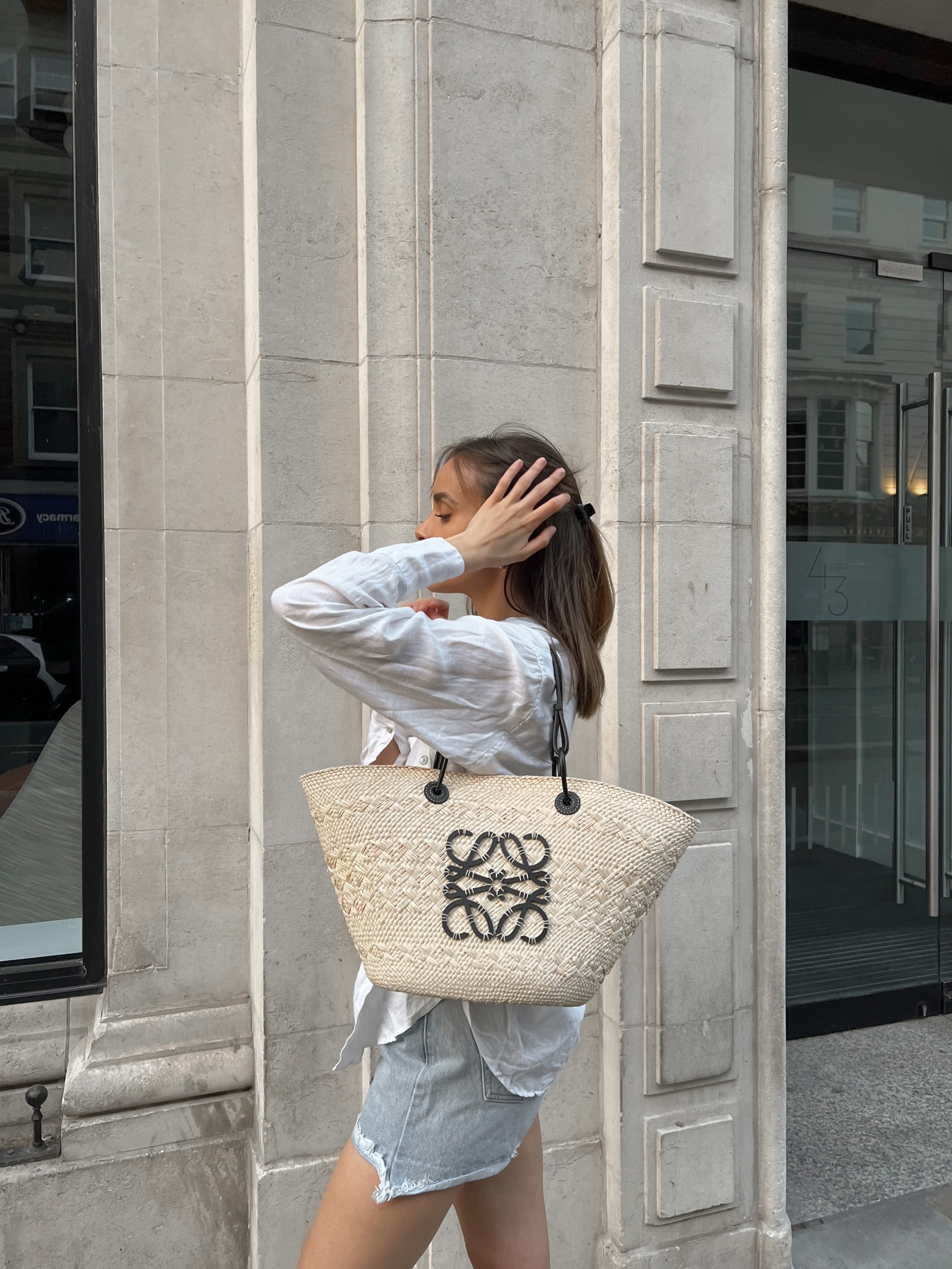 White shirt, basket tote bag, blue shorts, summer beach outfit ootd

#LTKeurope #LTKSeasonal #LTKstyletip