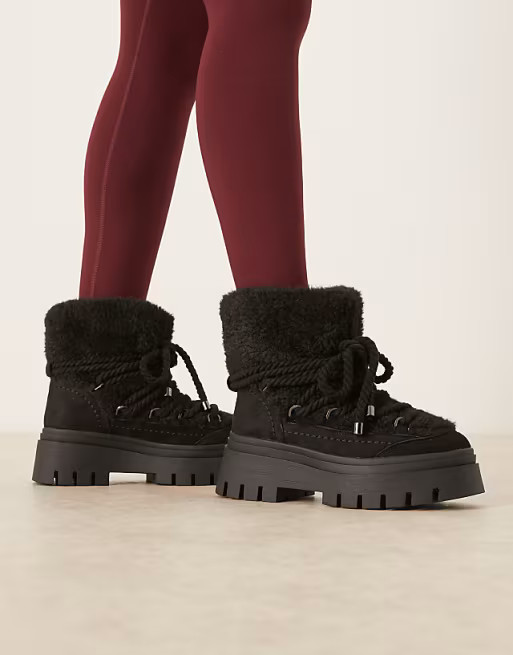 ASOS DESIGN – Acclaim – Schneestiefel zum Schnüren in Schwarz mit Lammfellimitat | ASOS (Global)