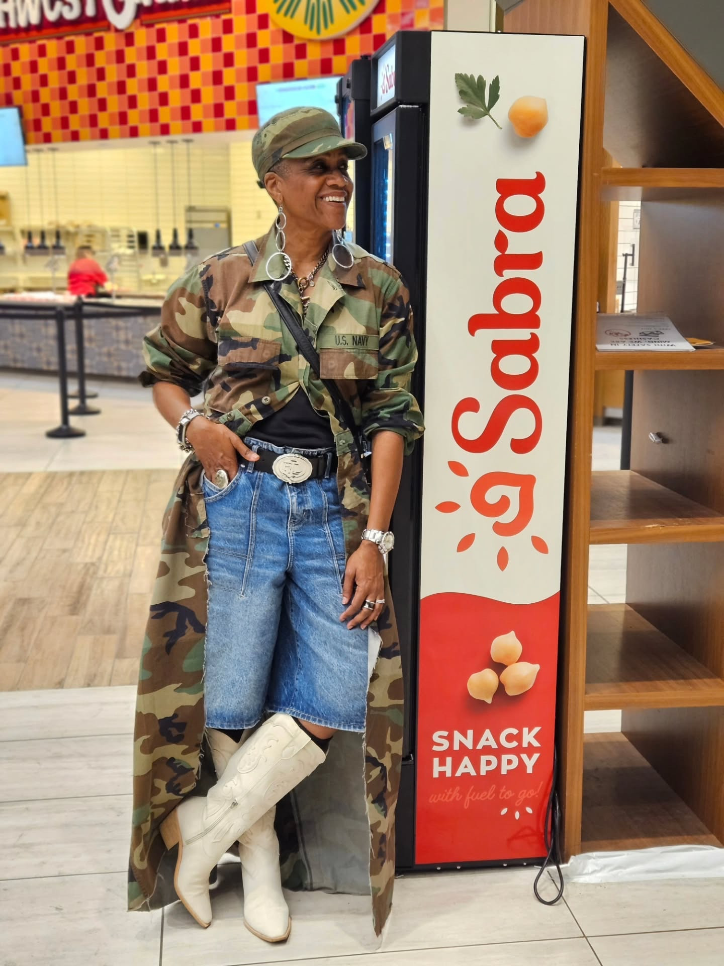 Probably not what they mean when they say you're looking like a snack, but it's official...I'm a snack. A happy one at that. Different pronunciation though. I'm Say-bra, the hummus is Sah-bra. Either way, snack happy.

Hubby and I went to Vegas for the annual SEMA automotive show and my outfit coordinated perfectly with a car I really despise (as a consumer vehicle), the Hummer. Like, why?

I hope this outfit encourages you to combine pieces that dont "go" together. Camo and western-inspired boots and belt buckle aren't obvious friends, but....it works.🙌🏾