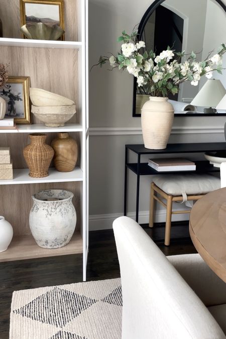 A small glimpse into our dining room! 

Console table, bookcase, Loloi rugs, arch mirror, our everyday home

#LTKhome #LTKfindsunder50 #LTKsalealert
