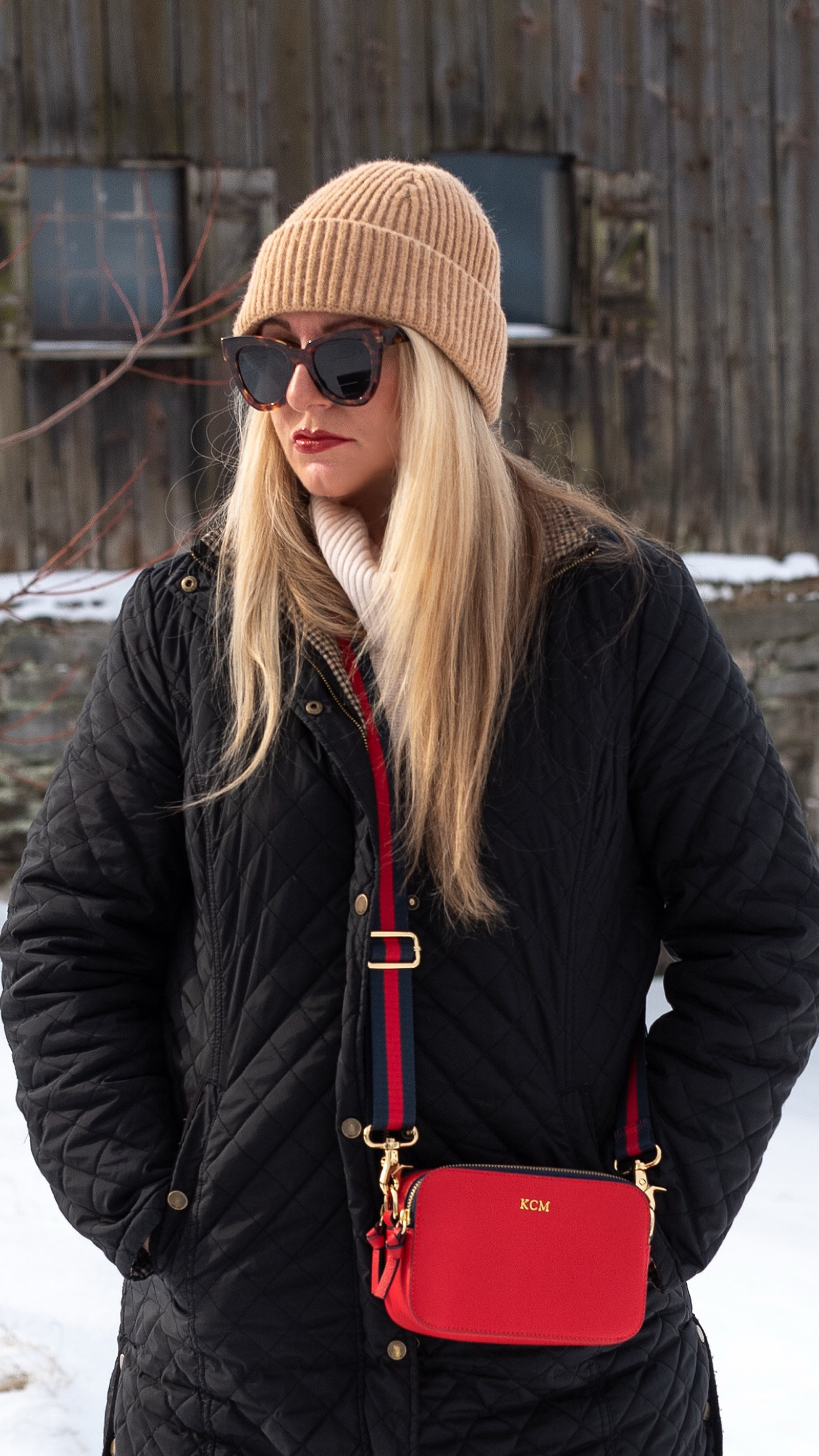 A great red leather crossbody bag with a striped strap. A fun way to add a pop of color to your winter wardrobe.

#LTKOver40 #LTKItBag #LTKMostLoved