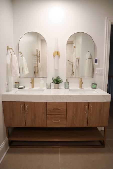 Bathroom vanity arch mirrors gold and white wood vanity 

#LTKhome