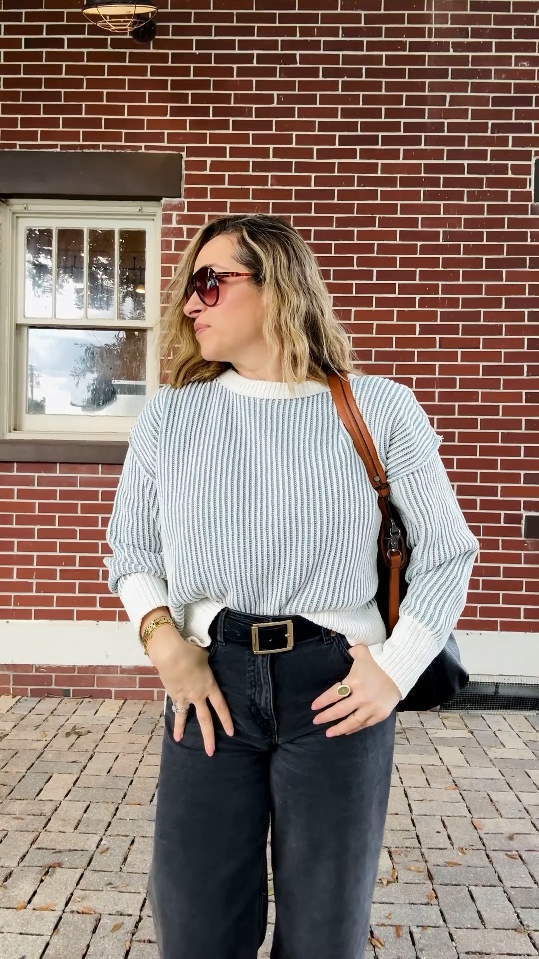 The perfect stripe COMFIEST sweater. I paired with mom jeans from H&M and since it’s still Florida, I grabbed these chic but casual black sandals, added a belt with gold hardware to match my jewelry and my go to tote bag. Got tons of compliments on this outfit as a 44-year-old mom of three.

#LTKStyleTip #LTKPetite #LTKSeasonal