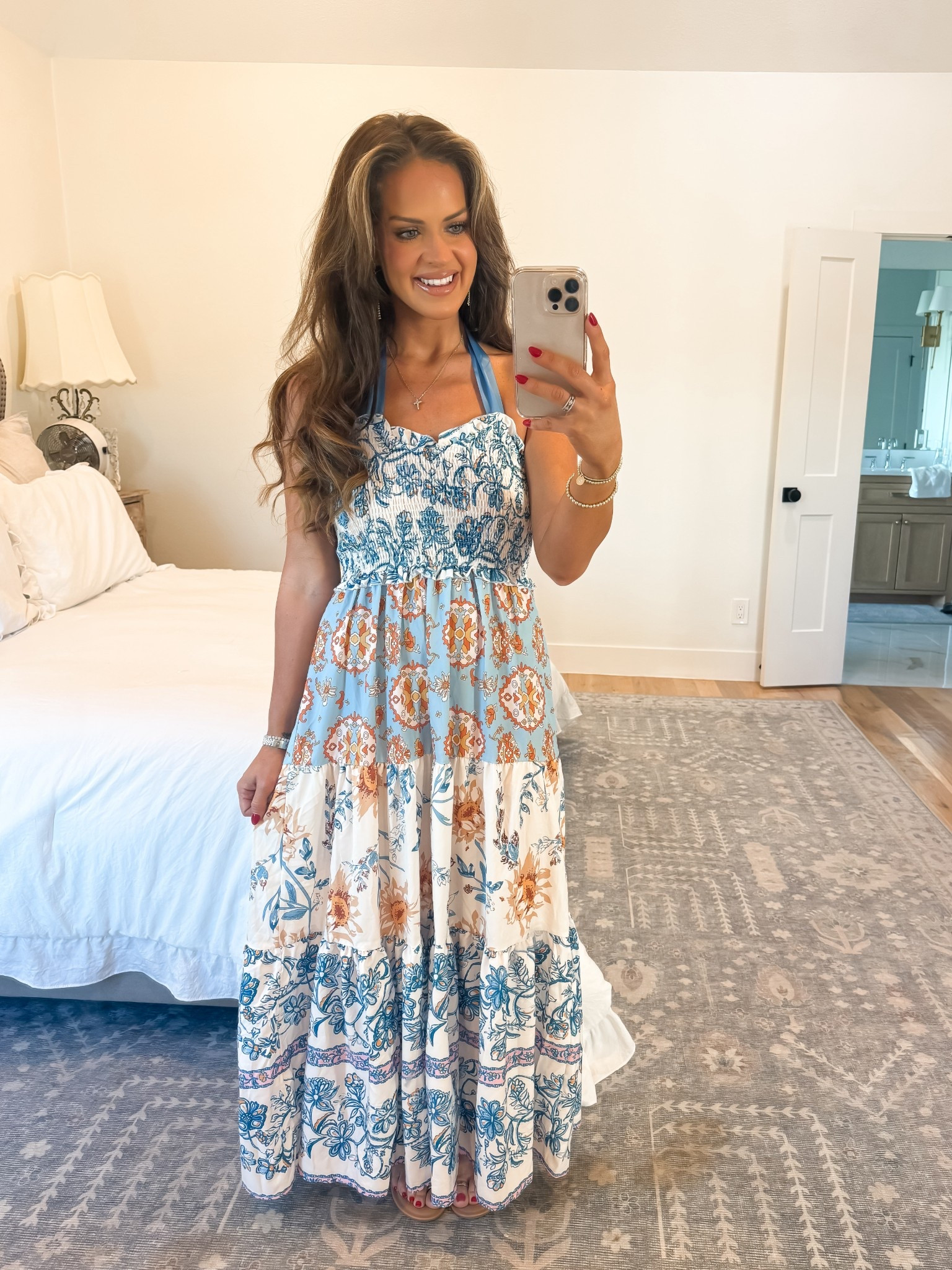 Floral maxi dress with gorgeous satin ribbons. I tied it into a halter but you can also use the straps in the back for a different look! Wearing the small. 

#LTKStyleTip #LTKFindsUnder50 #LTKFindsUnder100