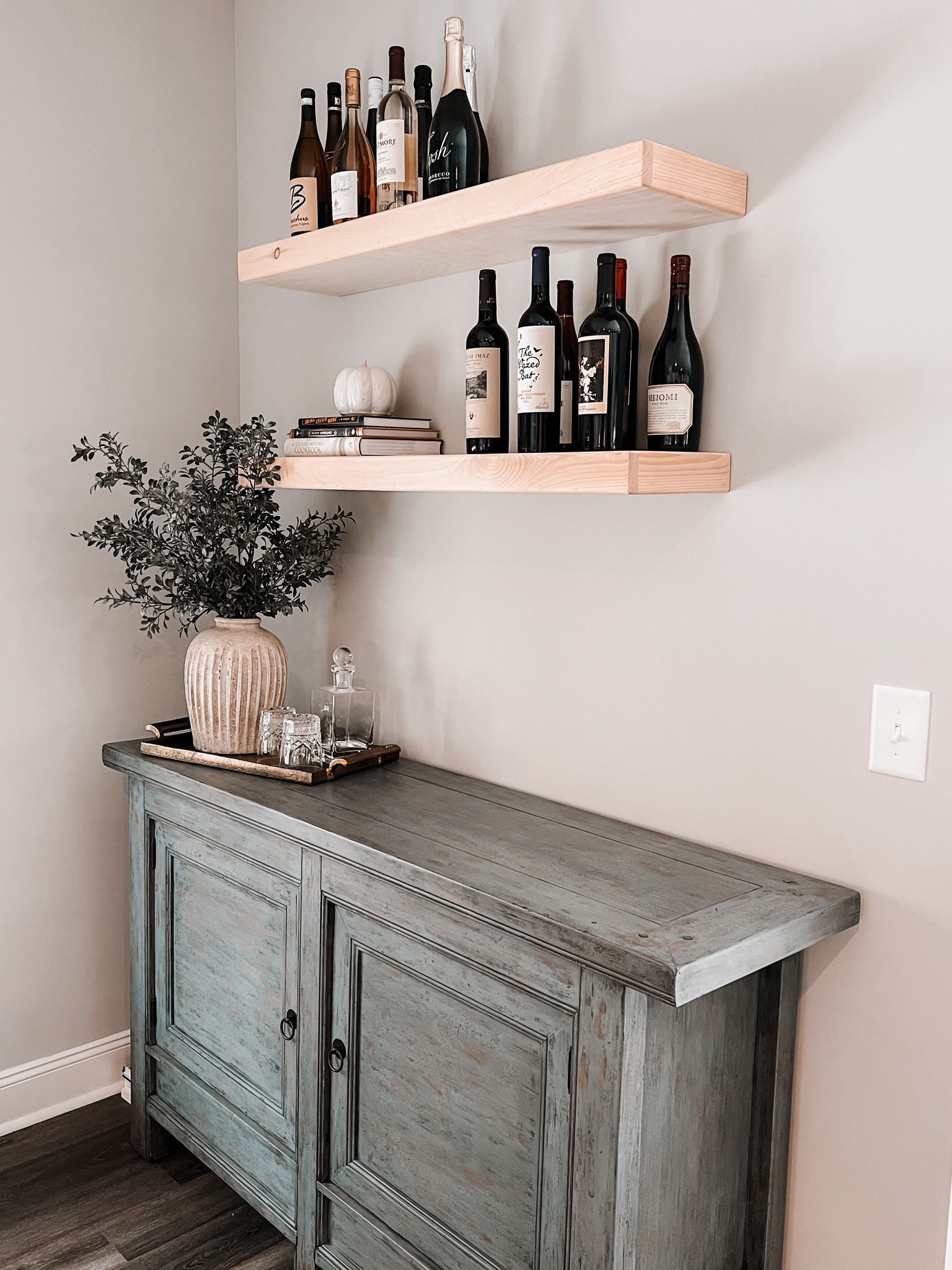 Bar coming along! Still trying to figure out what color to stain the floating shelves…

#LTKhome #LTKSeasonal