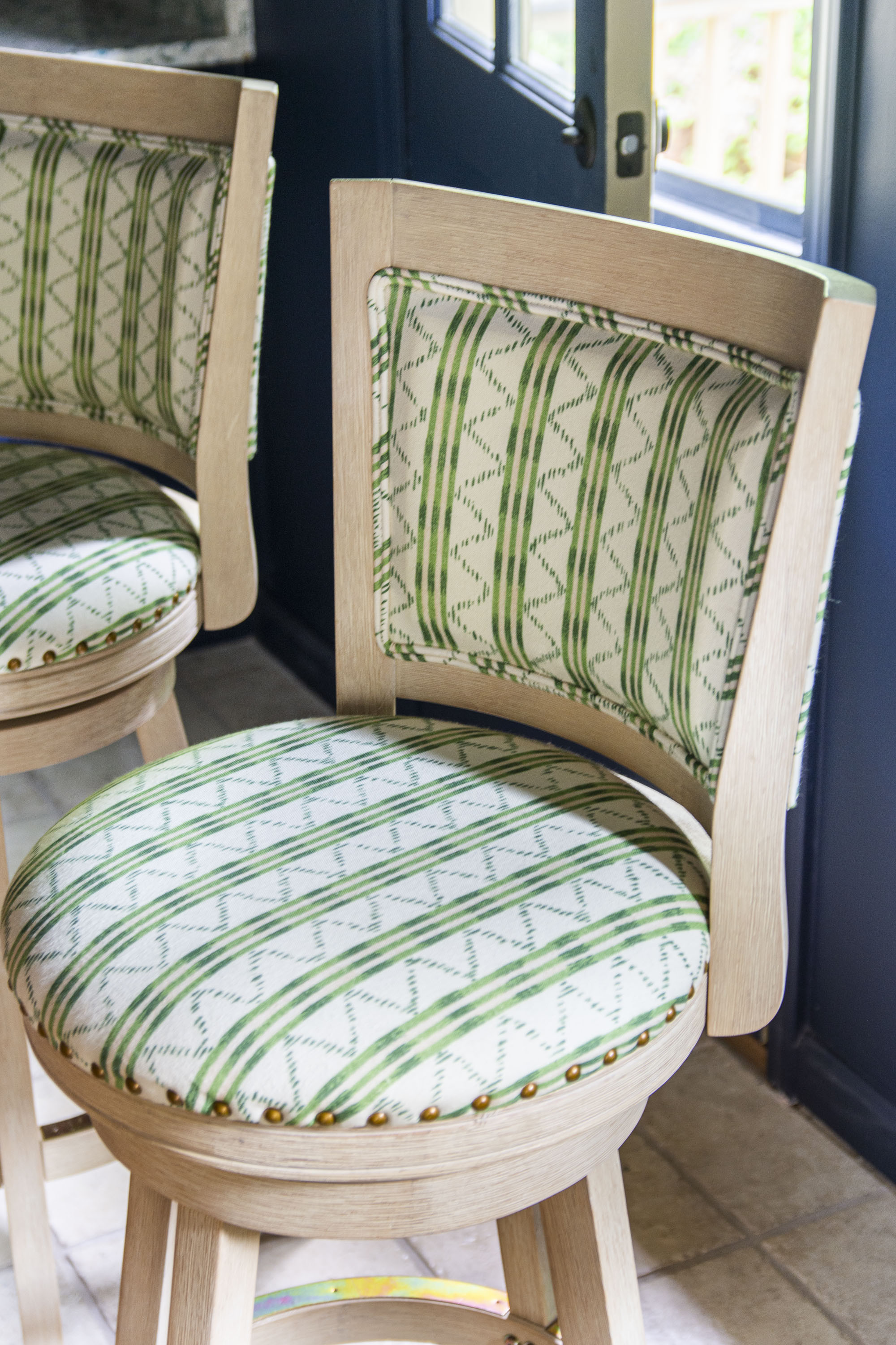 Best way to customize your bar stool for a tropical home bar - use a fabulous green ikat stripe fabric to reupholster them! This Oscar de la Renta fabric makes these barstools look completely custom and gives this tiki bar a designer look

#LTKStyleTip #LTKHome