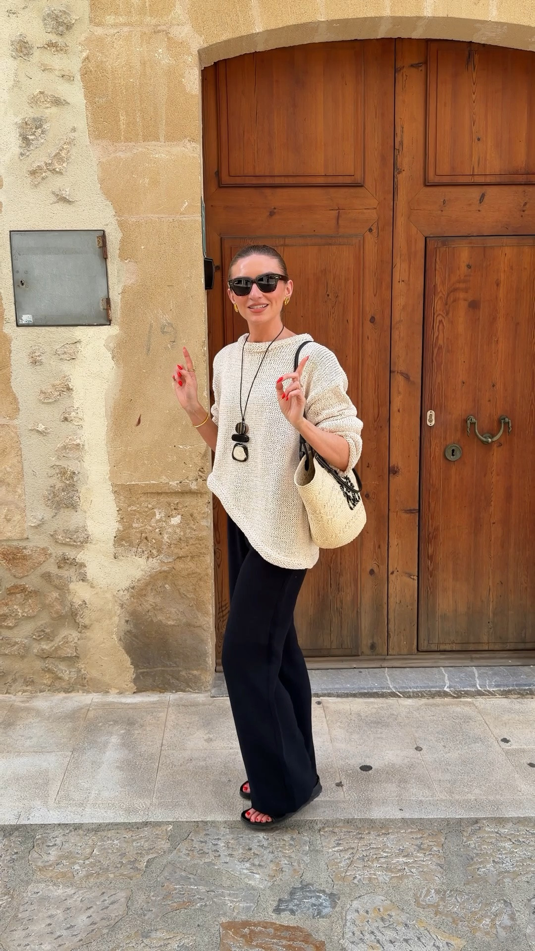 Holiday outfit 
Small in the Zara asymmetric jumper 
Exact trousers are Aritzia the lodge pants I can’t link on here so I’ve added similar 
Loewe basket bag
Birkenstock sandals
Zara pendant necklace 
Rayban state street sunglasses