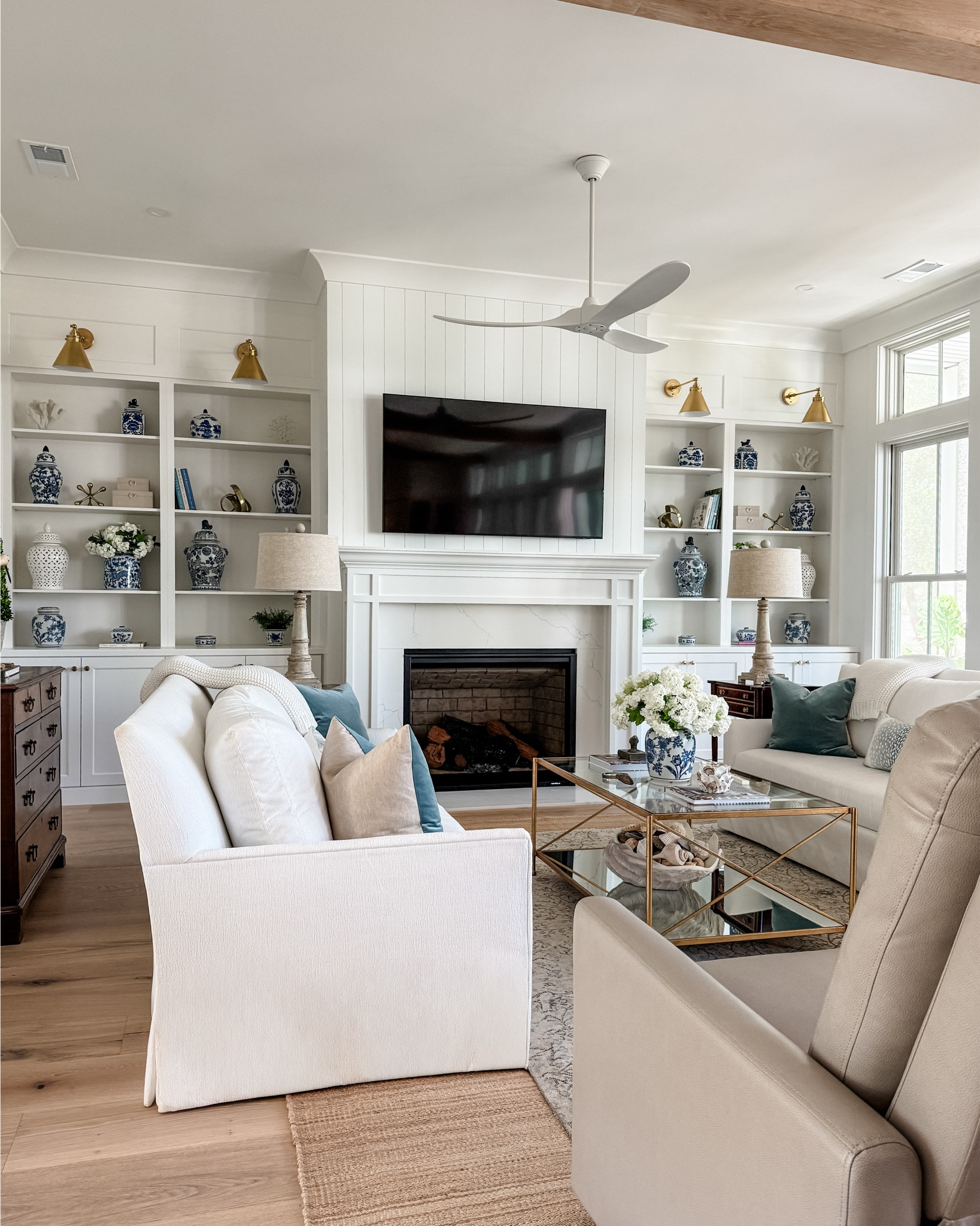 A calm, layered great room designed with intention in every detail — from symmetrical built-ins to soft, neutral textures and warm lighting that makes the space feel lived in, not just styled. I always lean into repetition, restraint, and natural balance when pulling a room together.

Shop my home + sources here 🤍

#LTKHome