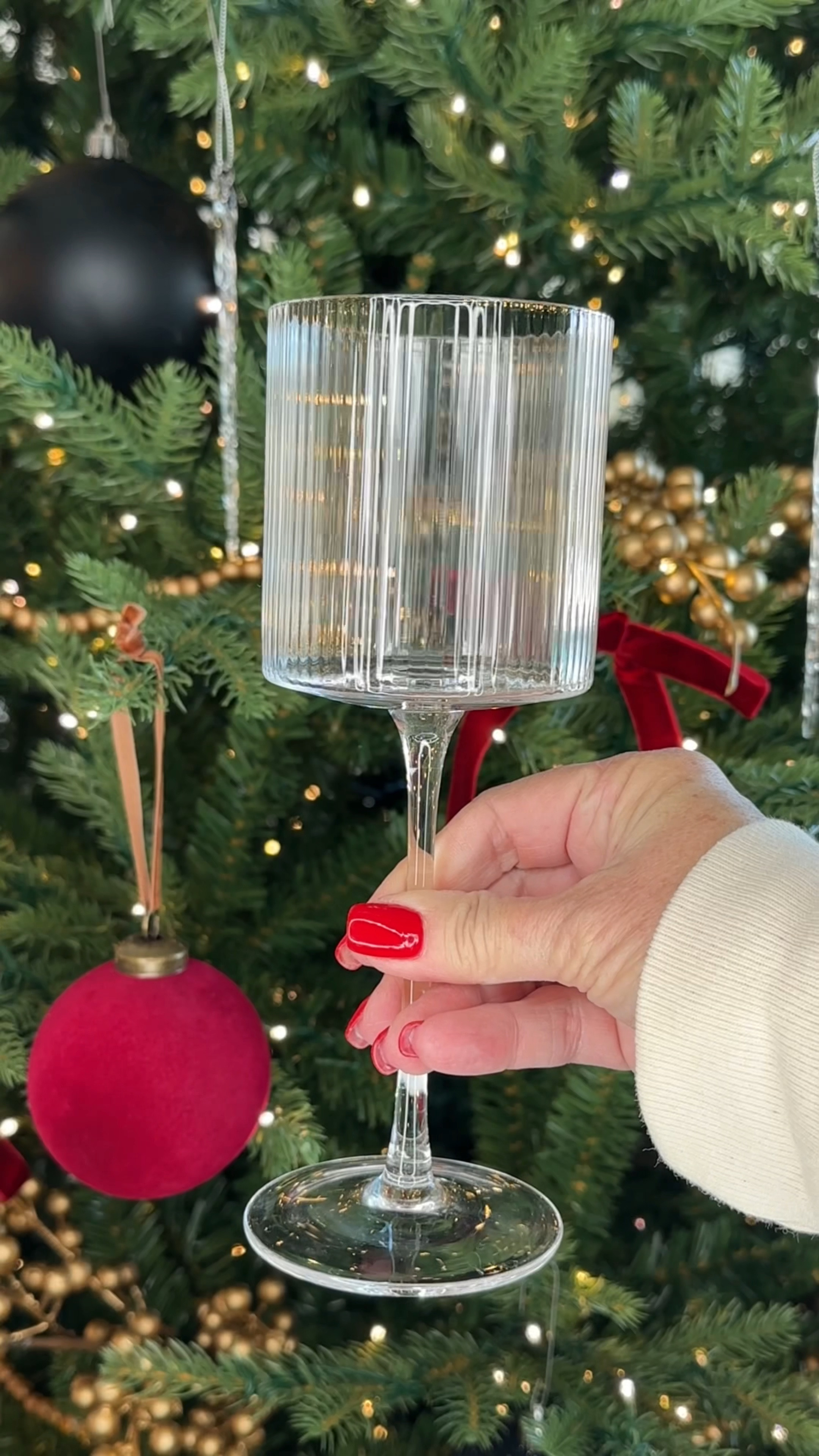These beautiful ribbed wine glasses make a perfect gift for the holidays! A set of 4 is under $35.00. Great gift idea for any wine lover or someone who loves to entertain! Add a bottle of wine for a hostess gift! 

#LTKHoliday #LTKHome #LTKGiftGuide