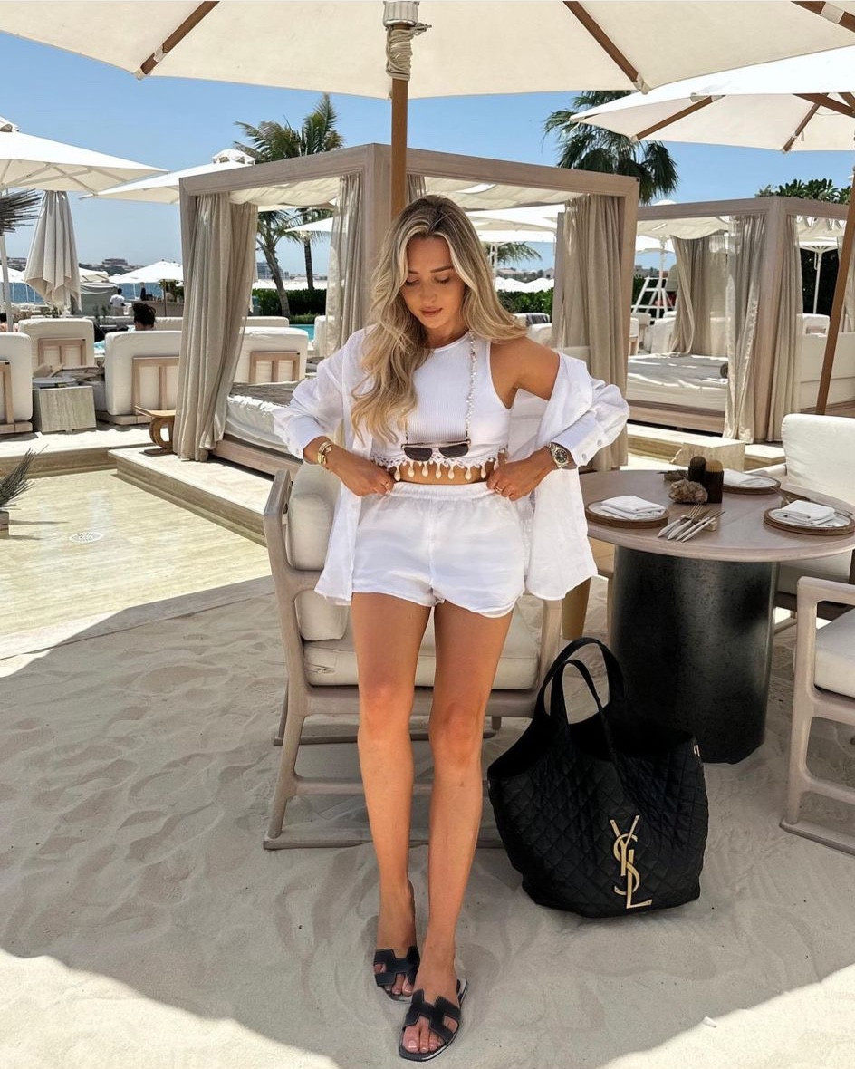 White linen look for Dubai with black accessories. White linen shirt & shorts, beaded white vest top (zara), black Hermes oran sandals, black ysl tote bag, Bottega sunglasses, Pearl frame chain

#LTKtravel #LTKstyletip #LTKSeasonal