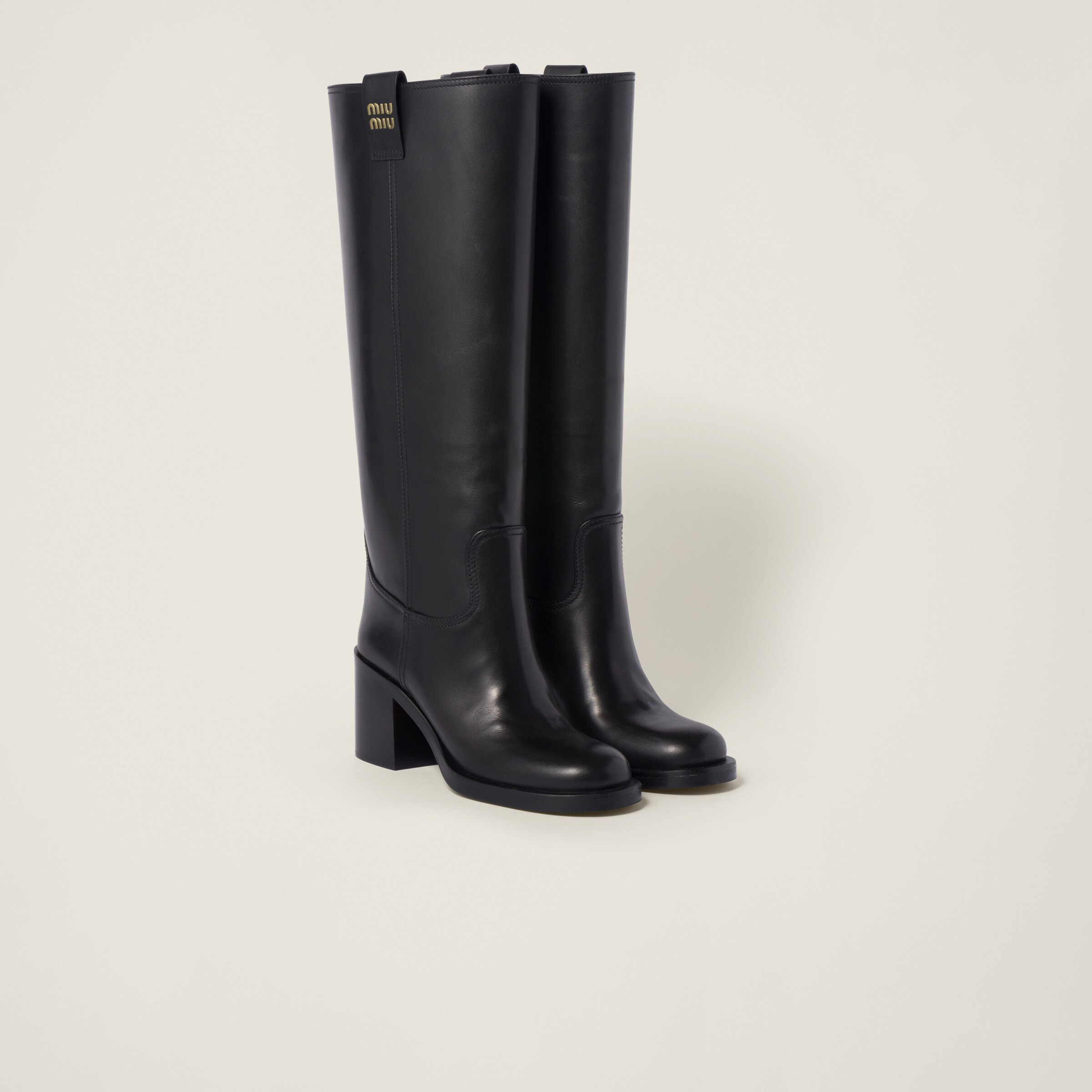 Black Leather Boots | Miu Miu | Miu Miu US