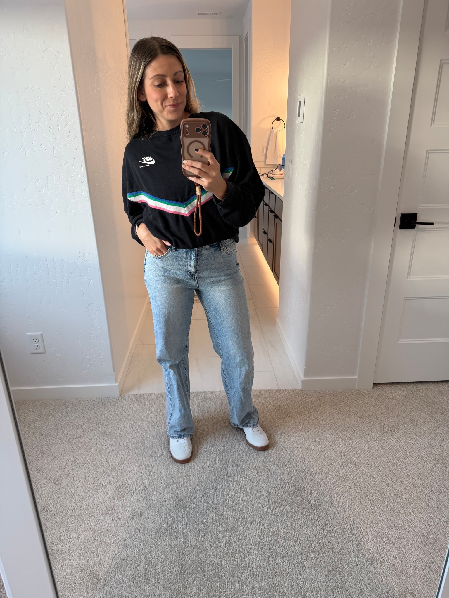 OOTD. Thrifted Nike sweatshirt, the most comfy Walmart jeans wearing an xs. You can definitely size down in these. They have an elastic waist in the back to make them the ultimate comfy fit. Plus for $15 you can’t beat them. Come in multiple washes and length options. My tennis shoes are walmart too! 

#LTKFindsUnder50 #LTKStyleTip #LTKShoeCrush