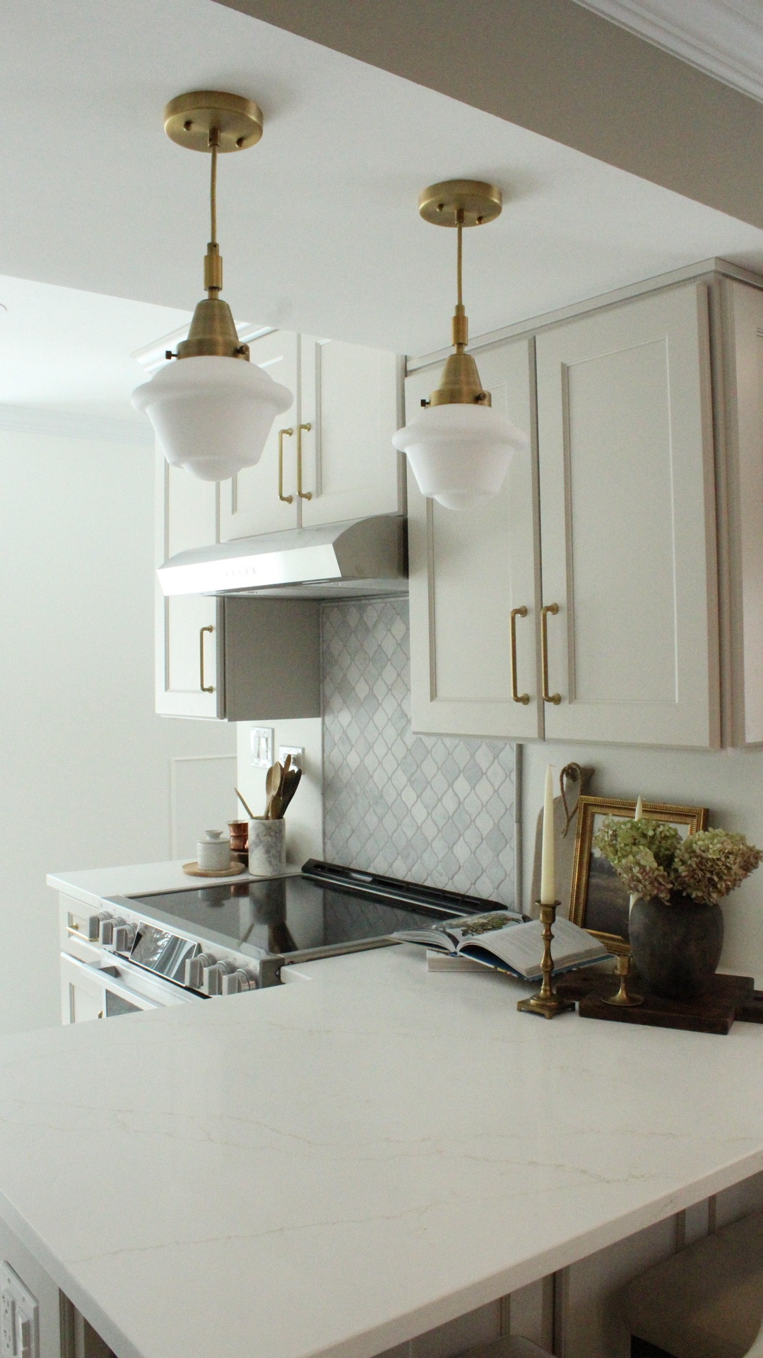 This kitchen came together so beautifully, and it’s one of those spaces that just feels good to be in 🤍

My client’s kitchen originally felt closed off, small, and a little generic, so we focused on opening it up where we could and layering in warmth to make it feel more inviting. We added a breakfast bar for extra seating, chose a soft warm beige cabinet color, and brought in brass accents with the prettiest beveled pulls and vintage-inspired lighting.

When it came to styling, I leaned into those cozy, lived-in layers I know so many of you love—warm wood tones, simple florals, and timeless pottery that make the space feel collected over time.

I linked similar pieces here to help you recreate this look in your own kitchen, whether you’re doing a full remodel or just updating a few details. And if you’re needing more personalized help, I’m now offering virtual design and styling services with options to fit exactly what you need 🤍 

Just leave a comment down below! 

#LTKHome