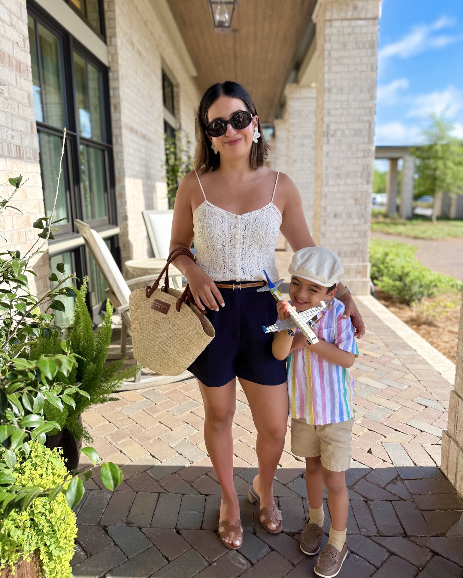 Summer is almost here ☀️

Outfit breakdown:
• Crochet tank top is size XS (true to size) for my usual 36/4Us in tops. The best way to wear it it’s with a strapless bra. 
• Navy shorts are size 40/8US (they run small I sized up one size). Super flattering and doesn’t wrinkle! 

Exact items are linked below 🫶🏼

#LTKStyleTip #LTKPetite #LTKTravel