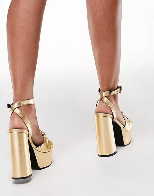 ASOS DESIGN Note knotted platform heeled sandals in gold | ASOS (Global)