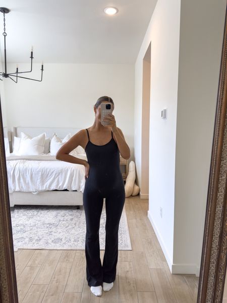 live for these jumpsuits and this is my favorite one I’ve found comfort and style wise! It feels so flattering on! Wearing a medium in black (sized up a size for the bump). 🙌🏽 @aritzia #aritziapartner 

#LTKfindsunder100 #LTKfitness