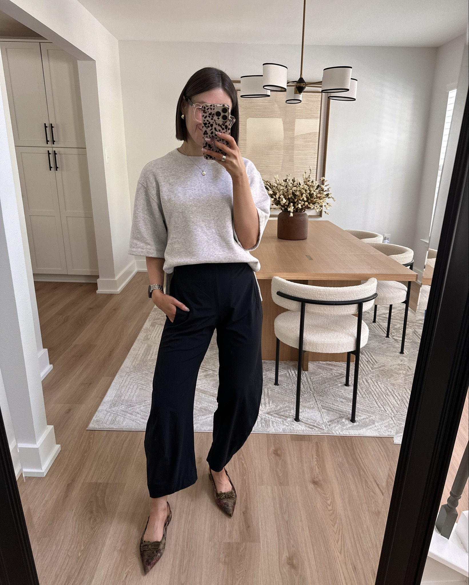 @Ruti on the loose work pants in black size 2 petite tts. I’m 5’3” & love the fit. These are perfect to dress up or down for traveling, running errands, or to the office. I could maybe even size down to 

Circus by Sam Edelman Delanie Pointed Toe Slingback Flat with moody velvety floral design. Will keep an eye out if they come back in stock! 

Abercrombie gray short sleeve oversized fleece tee. This is so comfy and it feels like sweats but looks put together! Sold out but has come back in stock a few times! 

Gold jewelry, gold hoops, chunky hoops, ring stacks, gold band, ballet flats, sling back flats, travel outfit, airport outfit, casual outfit 

#LTKPetite #LTKSaleAlert #LTKootd