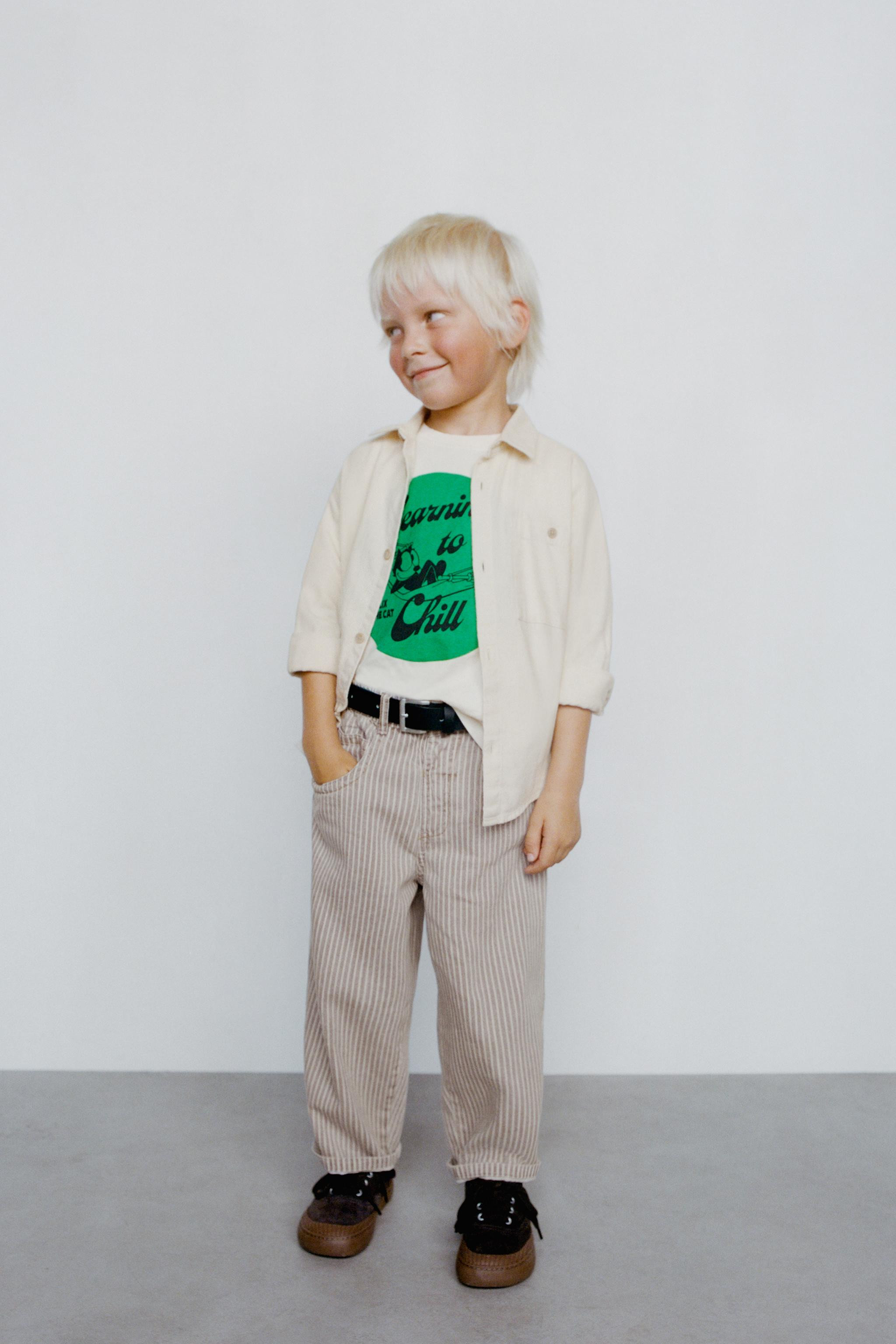 Shirt with a shirt collar and long sleeves with button closure. Front button closure. Patch pocke... | Zara Canada