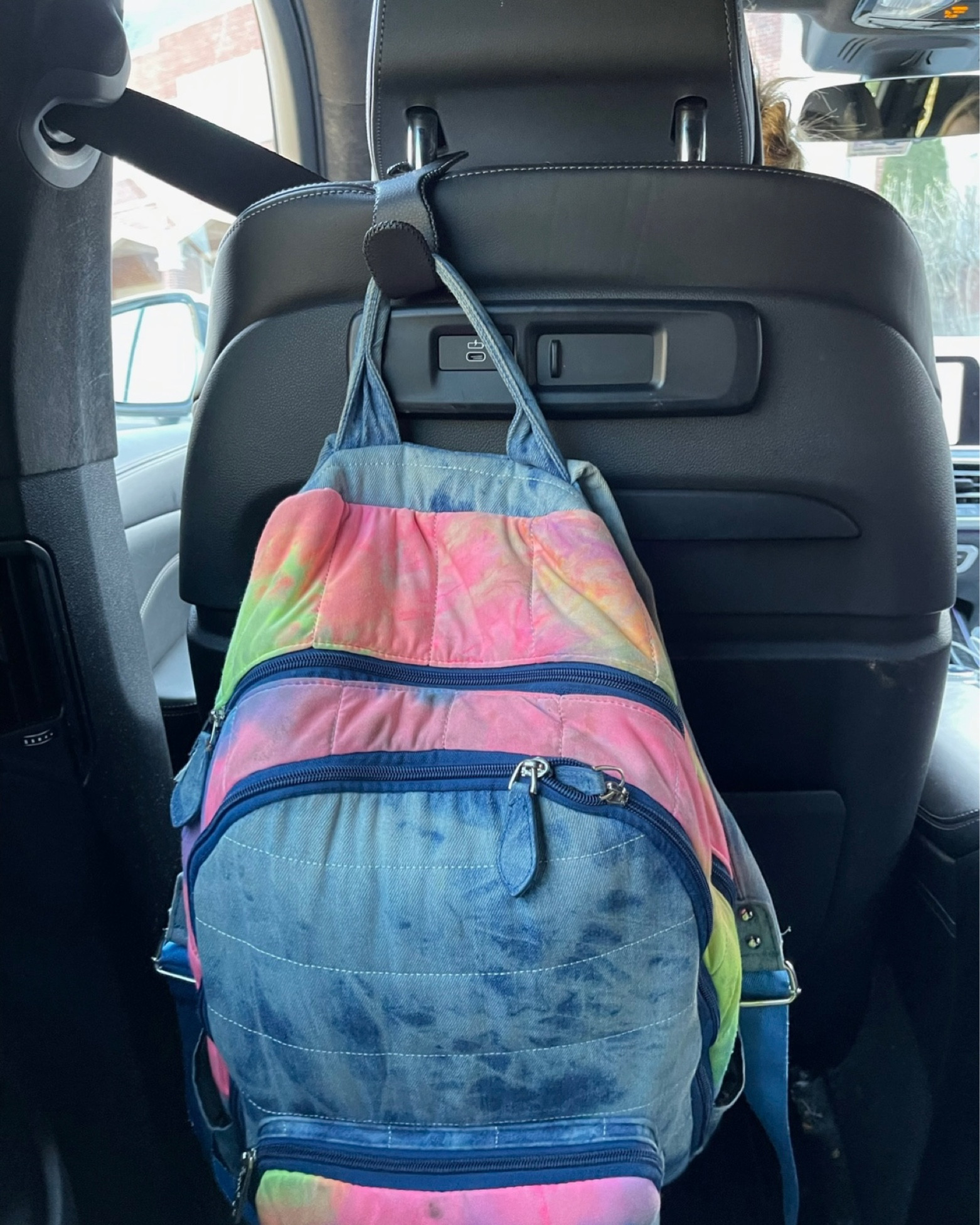 Hook them around the headrest to hold backpacks, groceries, sporting equipment, etc. In shades to match all different car interiors, these carpool must-haves prevent items from rolling around & getting stepped on by dirty sneakers.