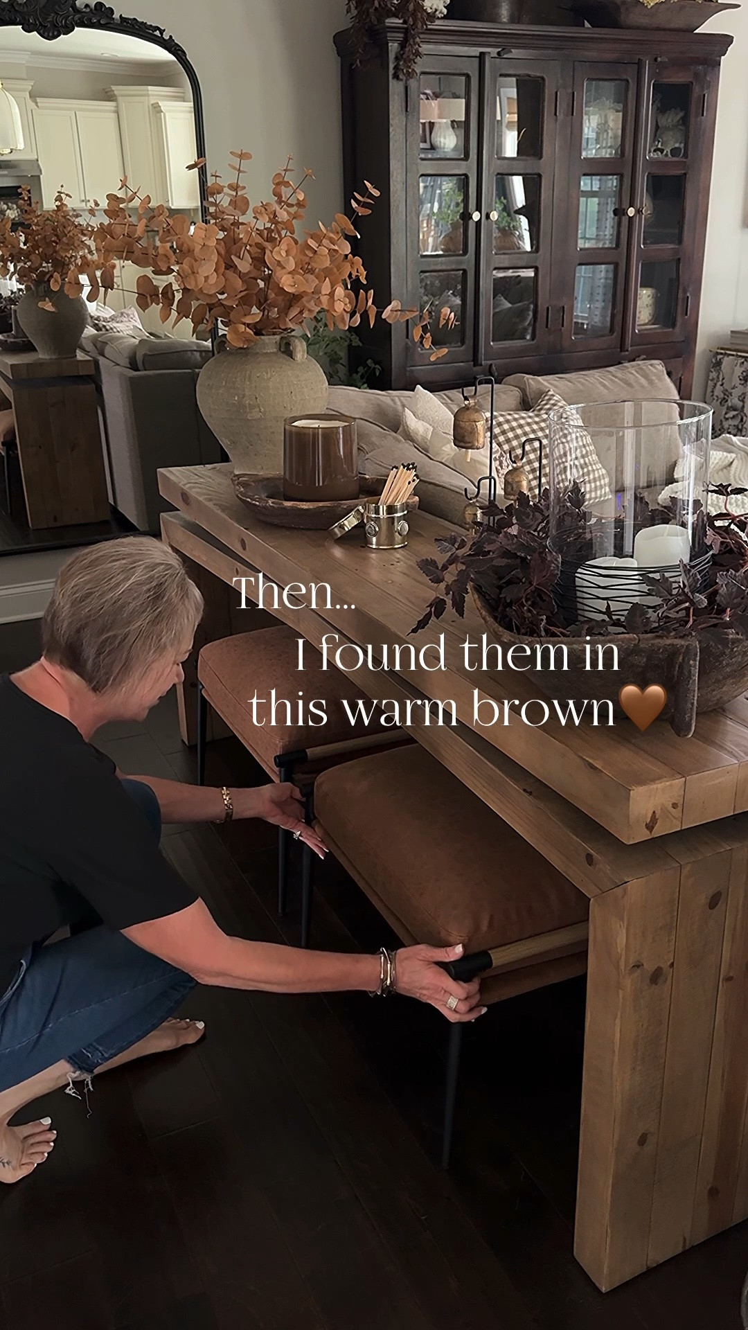 I love both of these ottomans!! I was thrilled to add the warmer brown ones for this holiday season. My console table is the 78” Sierra Rustic.

Ottomans, console table, brown vase, toasted eucalyptus, 100 oz candle, brass canister, matches, bells with stands, vintage bowls, plum garland, flameless candles, floor lamp with woven shade, stone riser, bronze urn, greenery stems

#LTKstorytime #LTKSeasonal #LTKHome