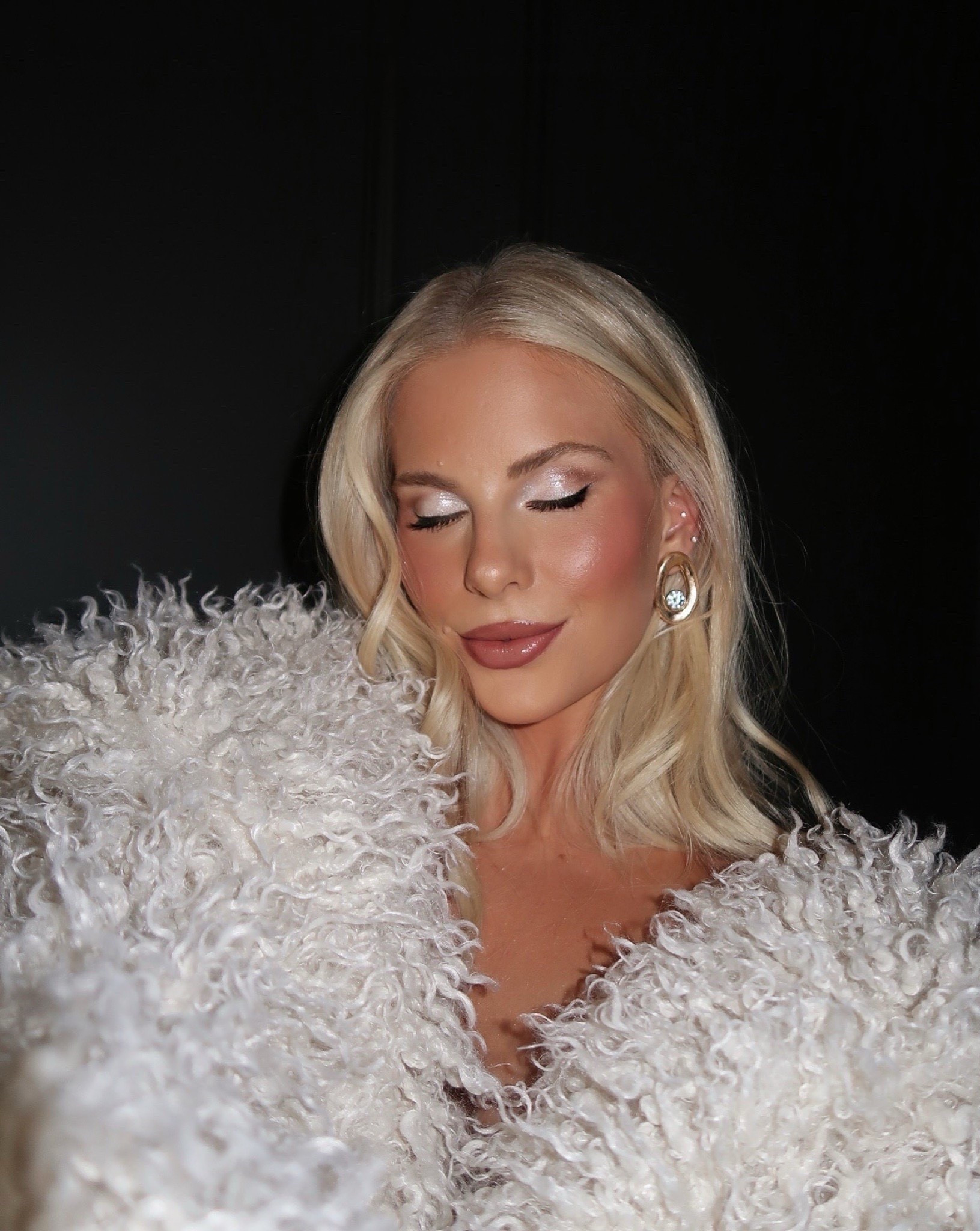 New Year’s Eve makeup ✨🤍❄️🪩
MY SHADES:
Foundation - 190 Cool
Concealer - N4
Bronzer - Medium
Loose Powder - Pound Cake
Duo Blush - She’s Flushed
Eye Primer - Original
Eyeshadow - Universal
(Base - White & Crease - Dark Brown)
Bronzer - Light-medium
Eyeliner - Black
Liquid Liner - Black
Mascara - Black
Brow Gel - Blonde
Lip Liner - Love Trap
Lipstick - Runway Royalty (linked similar)
Lipgloss - Honeysuckle
Glitter Shadow - Cosmic

Linking similar tops & earrings
#kathleenpost #makeup #glam

#LTKHoliday #LTKgrwm #LTKBeauty