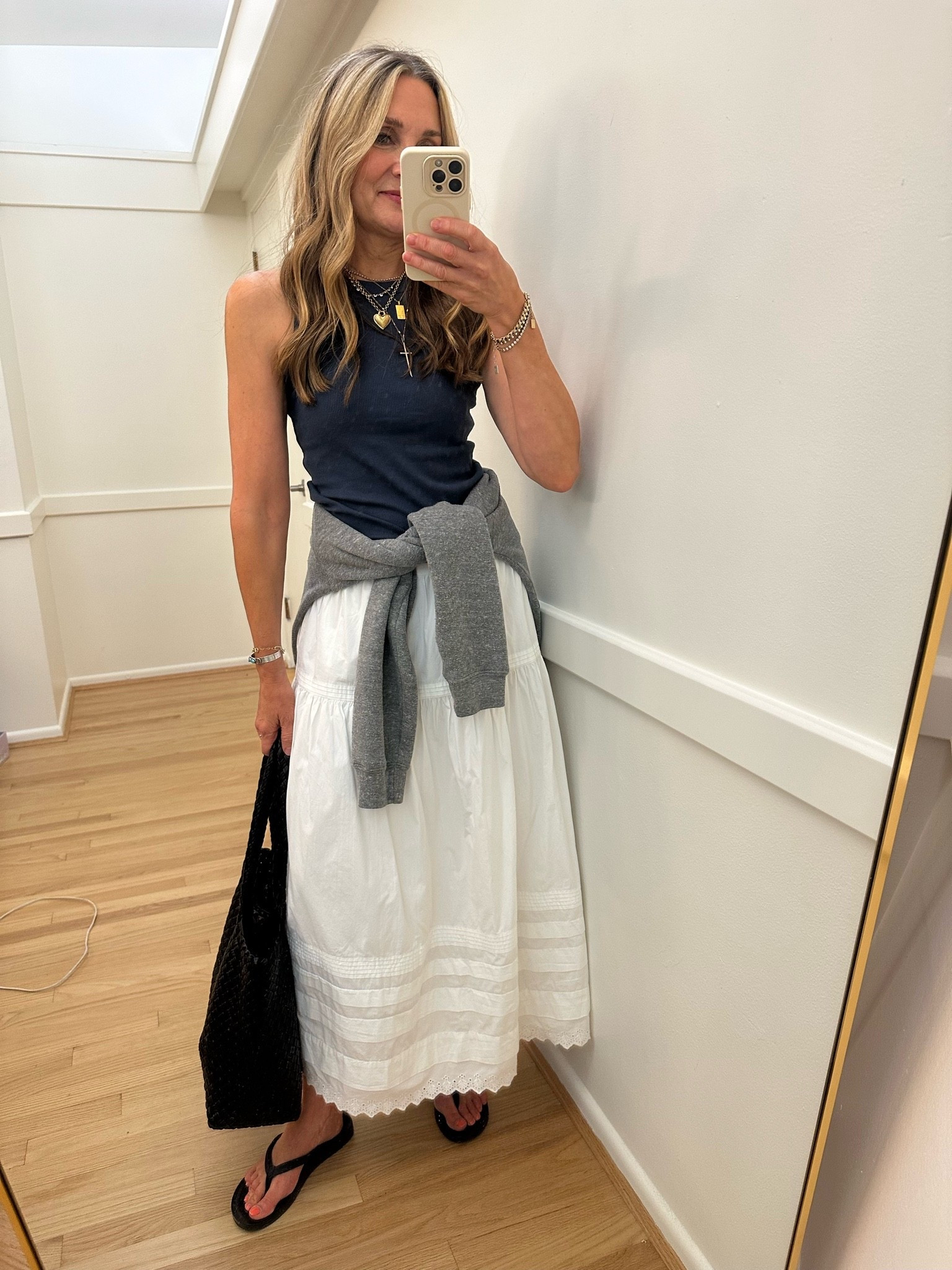 End of summer outfit! Wearing my @Quince white midi skirt for as long as possible! I’ll just throw on my favorite gray sweatshirt when it starts to cool down. 

I’m 5’7” and wear small in skirt and top.

#LTKootd #LTKOver40 #LTKWorkwear