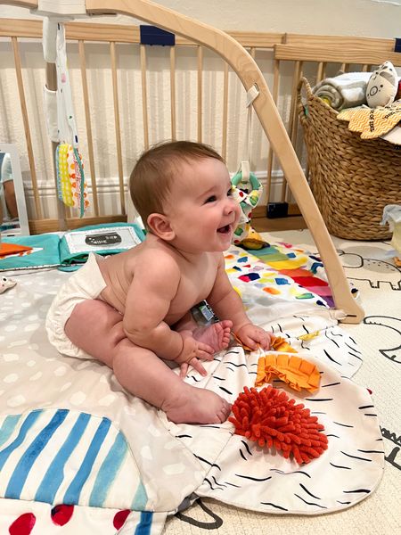 We had this same play mat for Oliver and now Beau is using it and he loves it! Works from newborn and Beau is 6 months now. Baby toys. Baby registry must have. Baby play mat. 

#LTKbaby #LTKbump #LTKfamily
