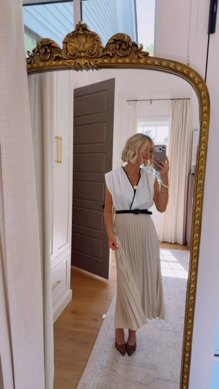 This is such a classic dress that you will be able to wear to so much! I even think you could wear this for work! Wearing XS! 

Loverly Grey, Zara, midi dress, fall dress,  pleated neutral midi dress, women's affordable workwear, chic fashion inspo for fall 

 #LTKSeasonal #LTKWorkwear