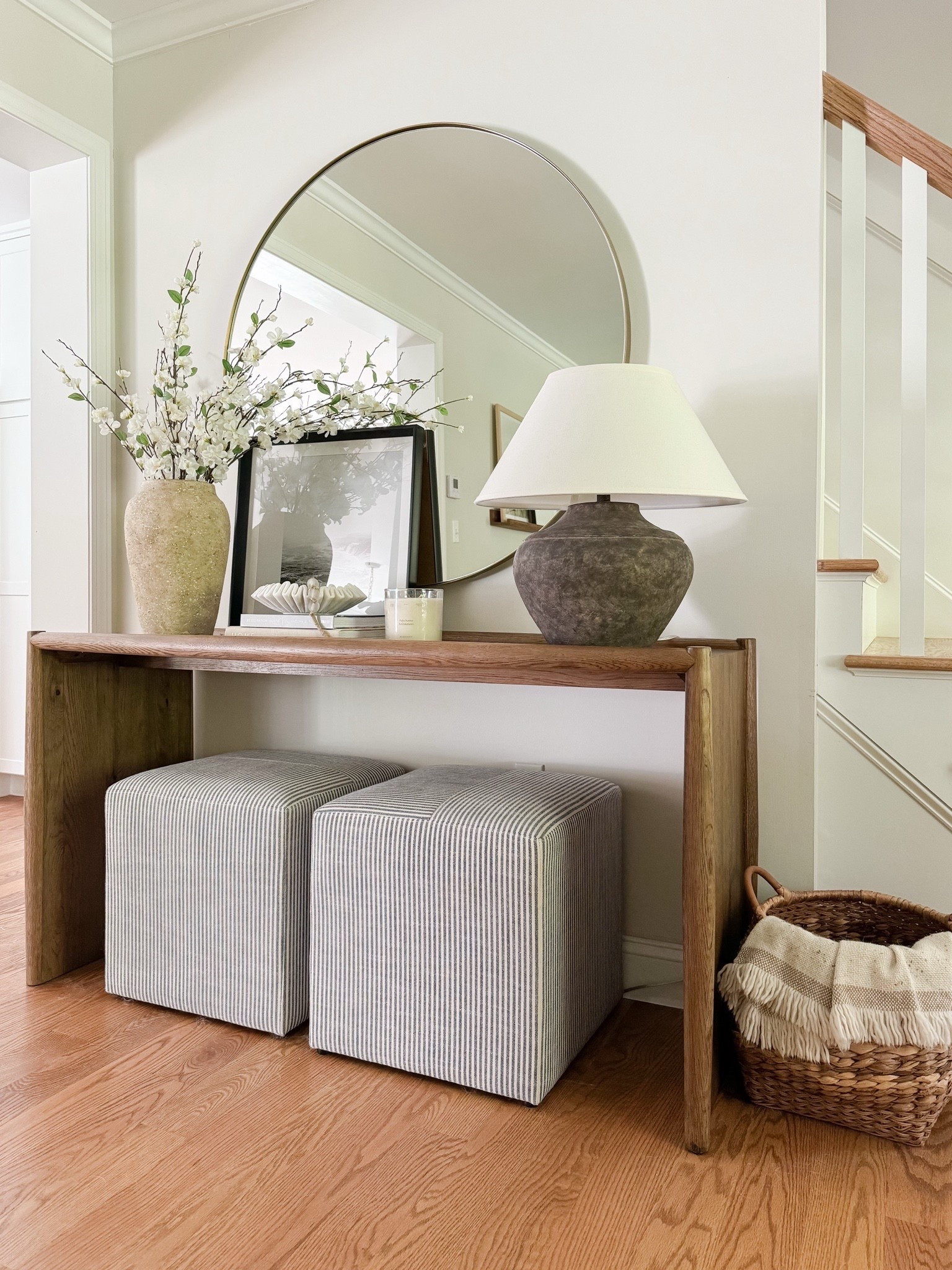 As we work our way through March, I’ve been having so much fun adding spring touches back to our home! A simple faux branch or a pop of pattern is often all you need to refresh a space. This console table has been a longtime favorite of mine, and I found a very similar dupe for a fraction of the price! These upholstered ottomans are out of stock, but I’m linking similars 🤍. 

#LTKHome #LTKSeasonal #LTKSaleAlert