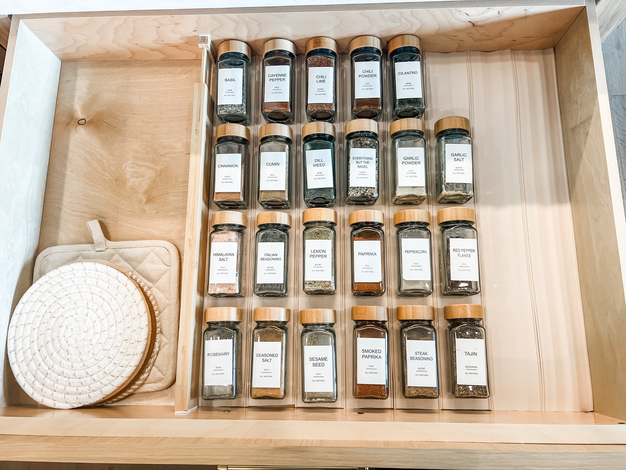 Two things we love: decanting spices and having a dedicated spice drawer. This grippy, grooved drawer liner is made specifically for spice jars and makes it so that they do not slide around when the drawer is opened. It's one of our favorite hacks for the perfect spice drawer - and something we use personally in our own homes. We love to share our tried and true products with you because we know they work and our goal is function first, but of course also make it pretty. 😘 

 