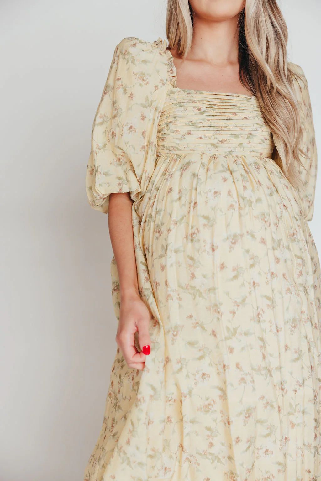 Melody Maxi Dress with Pleats and Bow Detail in Yellow Floral - Bump F | Worth Collective