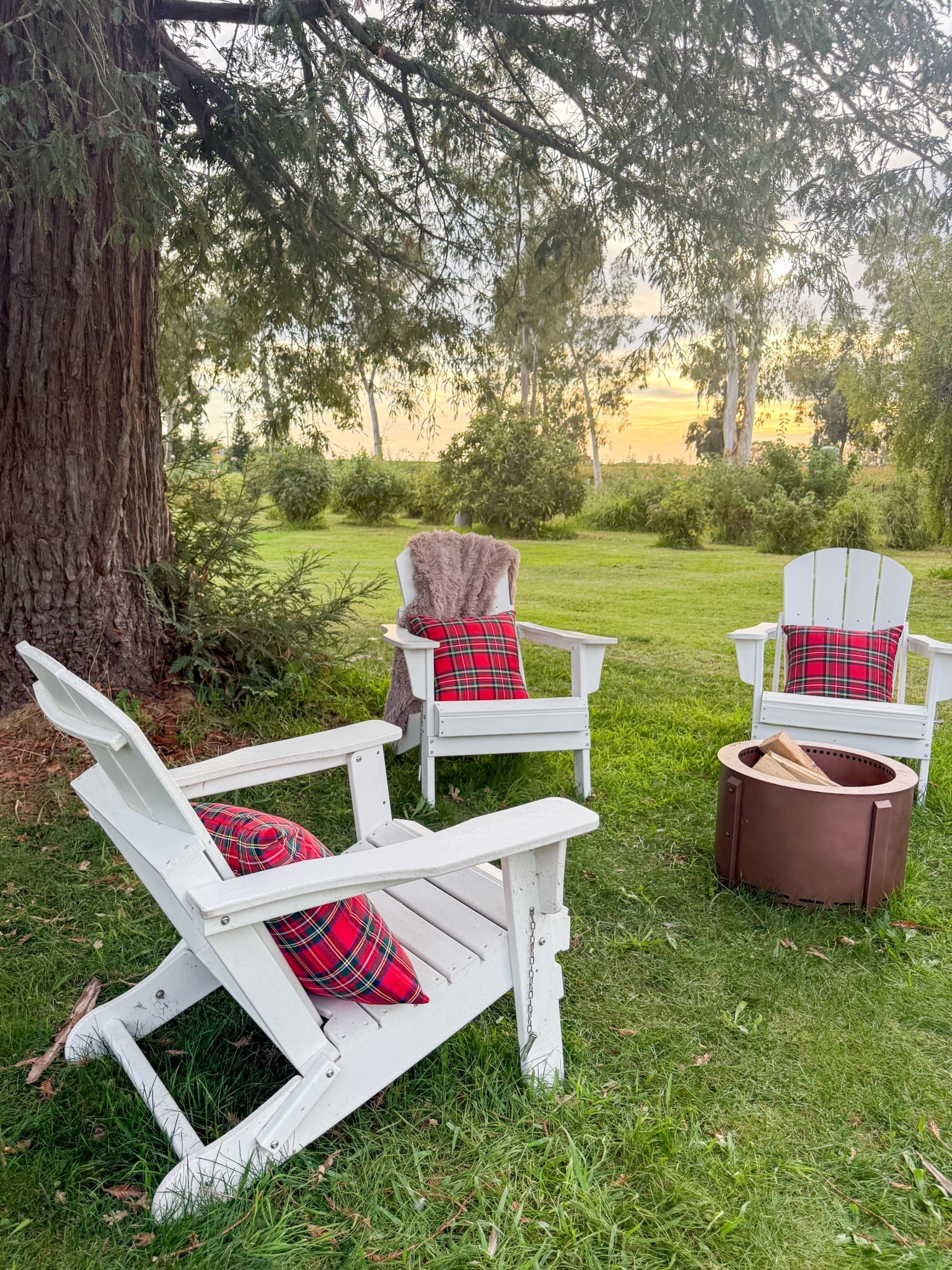 The coziest fire pit essentials for the holidays! Love those white Adirondack chairs, red tartan plaid throw pillows and a smokeless fire pit from @wayfair! #wayfair #wayfairpartner #ad 

#LTKdayinmylife #LTKHoliday #LTKHome