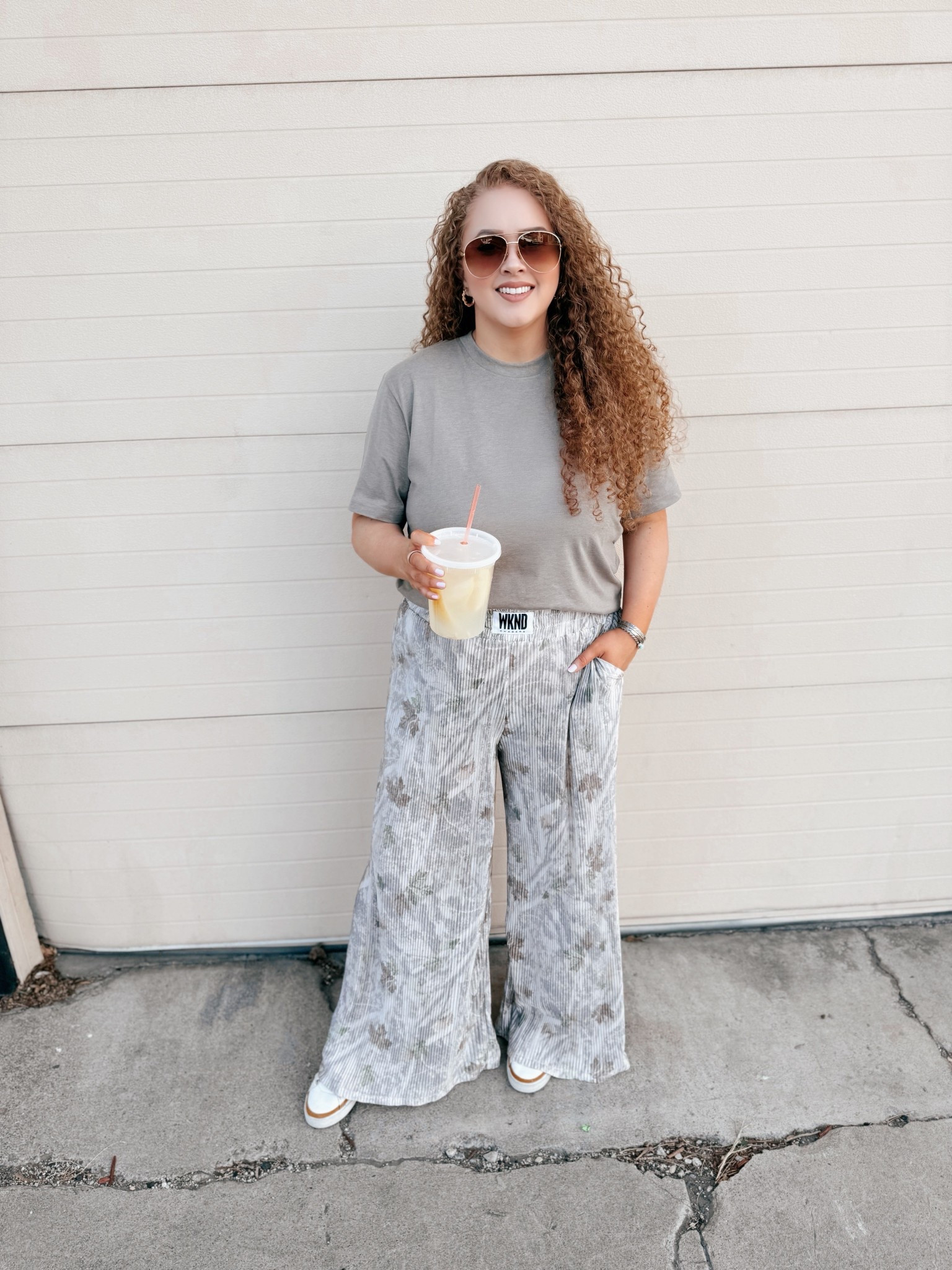Easy, breezy, and a little bold 🍋 Flowy camo + a laid back tee is my go to when I still wanna feel cute but comfy. Finished it off with sneakers for that everyday effortless vibe.🙌🏻 spring outfit | casual outfit inspo | everyday style | comfy chic outfit | camo pants outfit | camouflage pants | plisse pants | flowy pants outfit | relaxed fit outfit | graphic tee outfit | neutral casual look | athleisure style | nike sneakers outfit | sporty casual outfit | off duty style | effortless outfit | running errands outfit | comfy spring look | cool girl outfit | casual street style

#LTKootd #LTKdayinmylife #LTKMidsize