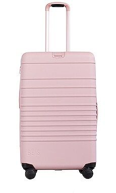 The Large Check-In Luggage in Atlas Pink | Revolve Clothing (Global)