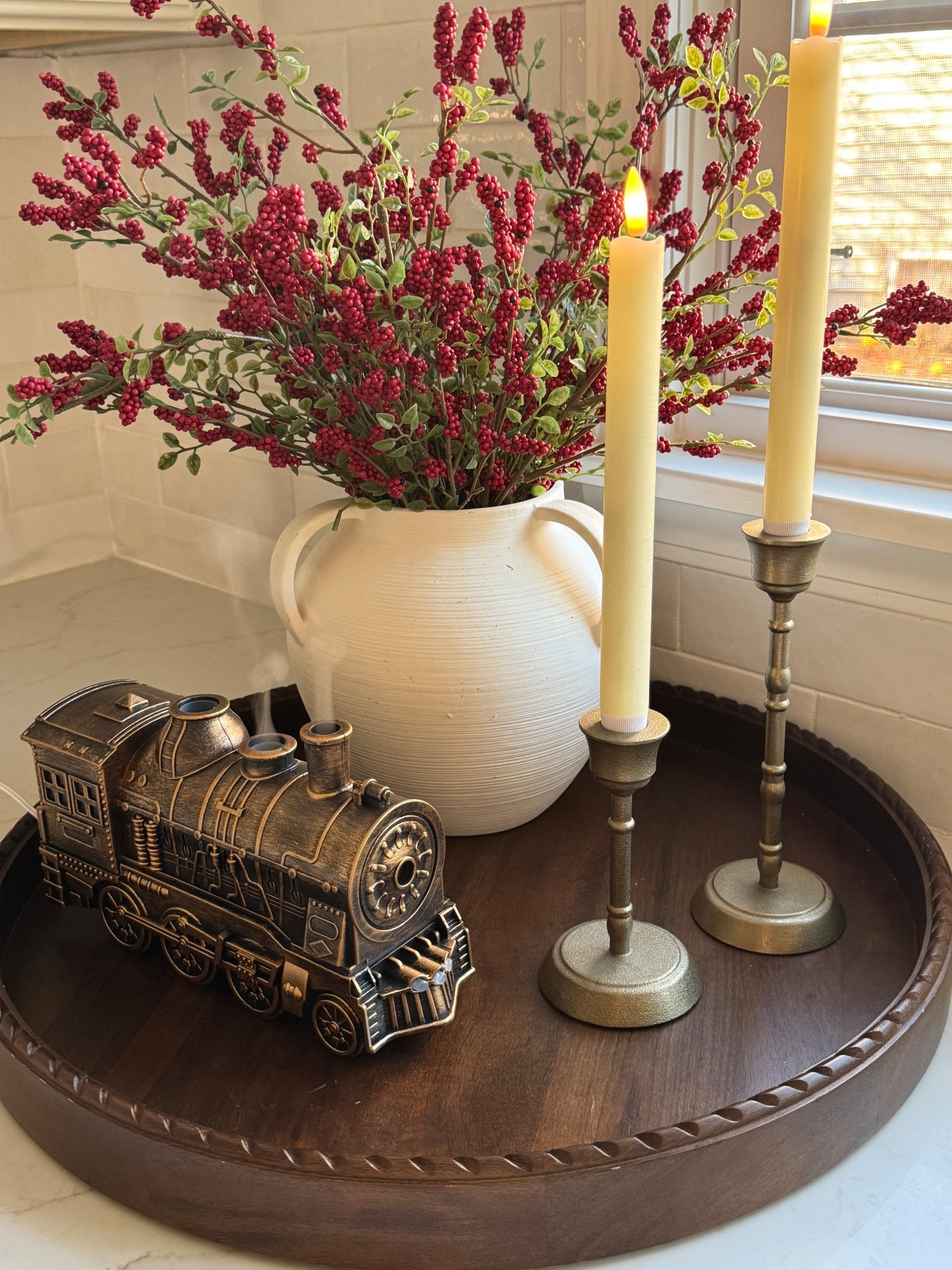 Cozy vibes and a little Christmas nostalgia 🚂✨

This vintage train is actually an oil diffuser making the whole space smell as cozy as it looks! 