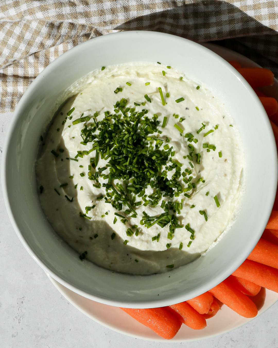 The kitchen tools I used to make my new High Protein Cottage Cheese Dip recipe and honestly these are just my everyday kitchen essentials that I reach for constantly 🤍✨ The KitchenAid 3.5 Cup Food Chopper, the Vitamix Explorian E310 Blender, the OXO Good Grips 3 Piece Silicone Spatula Set, the Henckels Classic 7-inch Hollow Edge Santoku Knife, and the Gorilla Grip BPA-Free Reversible Kitchen Cutting Board Set of 3. If you are building out your kitchen with quality tools that will actually last these are the ones worth investing in. The Vitamix is a forever appliance and the Henckels knife is one of my all time favorites. Everything is linked! 

 #LTKdayinmylife #LTKfoodie #LTKHome