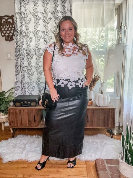 Fall midsize ootd/ Thanksgiving outfit idea 
Use code SHELLI20 on the faux leather maxi skirt- wearing size large 
Lace vest is a one size and very good quality. Also comes in black 
Bodysuit size XL def size up runs small 

#LTKover40 #LTKHoliday #LTKmidsize