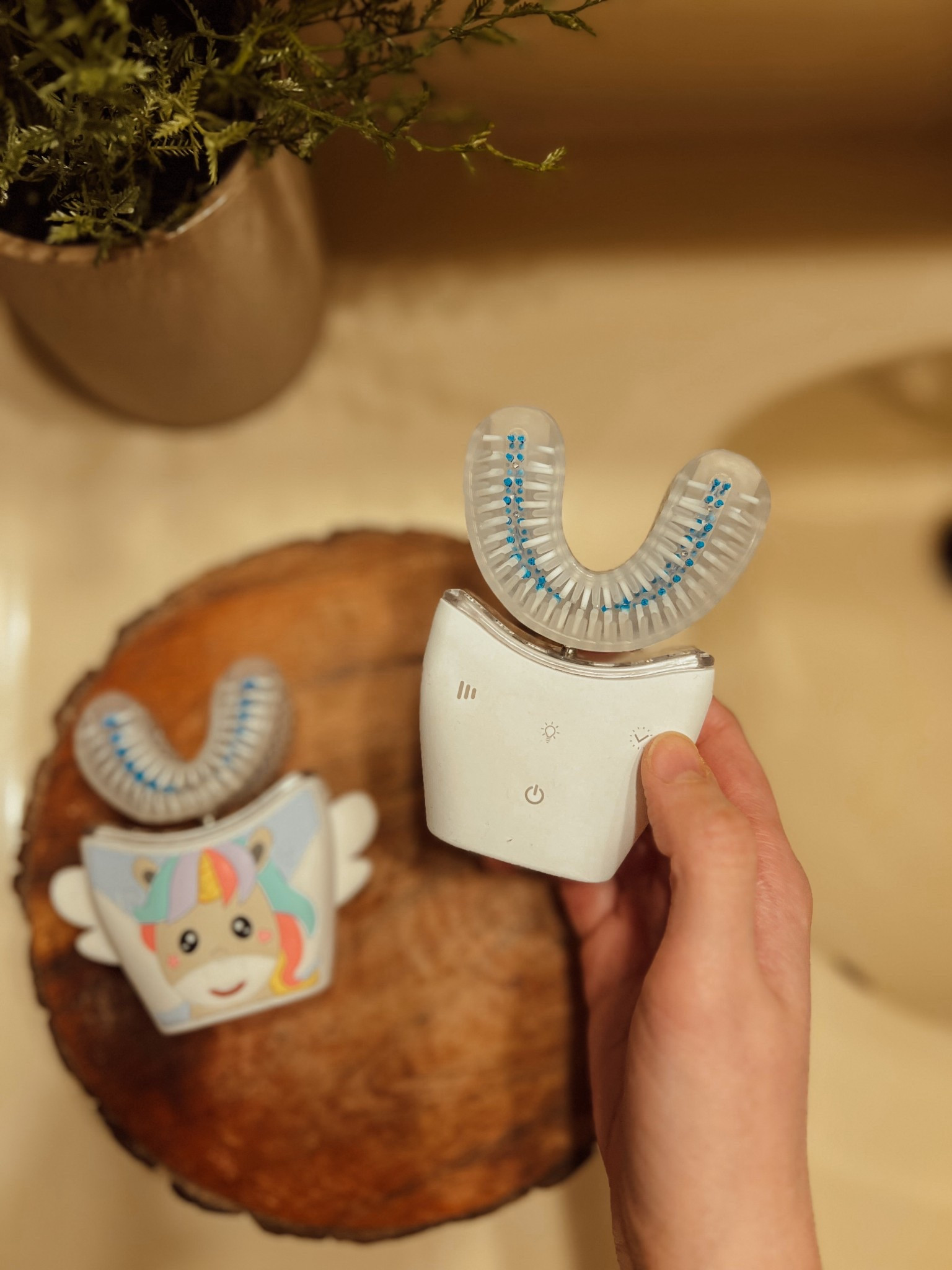 Our new toothbrushes make brushing so much more fun! The u shaped design cleans all your teeth at once - and the kids music feature is genius! Makes brushing so much easier and fun for my kids. 

#LTKmomlife #LTKKids #LTKmorningroutine