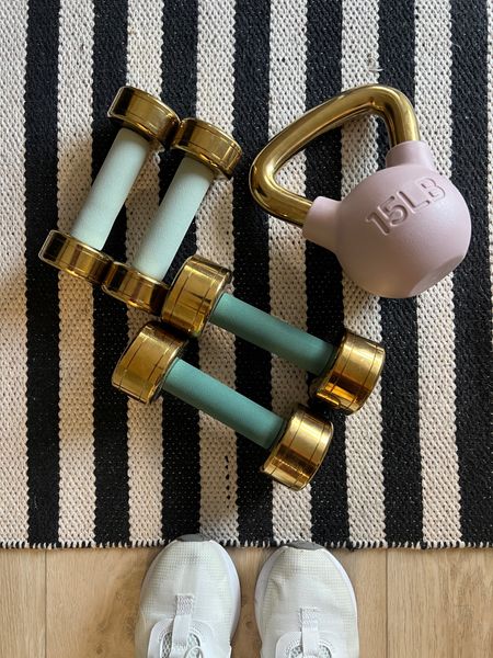 Gold dumbbell and kettle bell weights! The rug is an amazon find. Sneakers are big kids, I wear an 8.5 in women’s, 6.5 in big kids. These are my favorite running shoes! #meandmrjones 

#LTKunder100 #LTKhome #LTKunder50