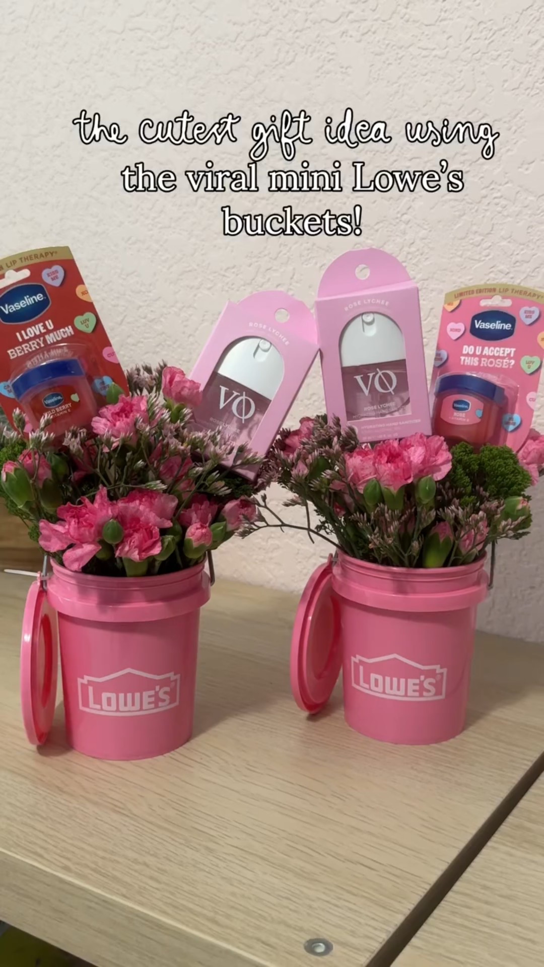 Under $30 for both! 💘✨ Ok is this not the cutest little gift?! If you’re like me and you were wanting the viral mini pink Lowe’s buckets but weren’t quite sure what to actually do with them- try this! Fill with flowers, I got the 3/$12 bouquets at Publix and filled with some other little Buy 3, get 1 FREE finds from Target making this super affordable! 

Follow + comment “GIFT” for a link to everything (except the flowers) ✨ & if you love Holiday finds and gift ideas, follow along for more!