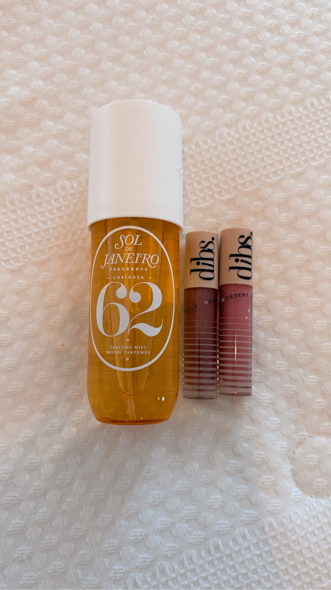 my recent @ulta purchase! the @DIBS Beauty lip glosses are my fave!! i have effortless pink & MIMS. they’re currently on sale for 50% off making them $12! the sol de janeiro hair & body mists are my fave!! 62 & 40 smell soooo good if you love vanilla scents 💗💛

#LTKSaleAlert #LTKselfcare #LTKBeauty