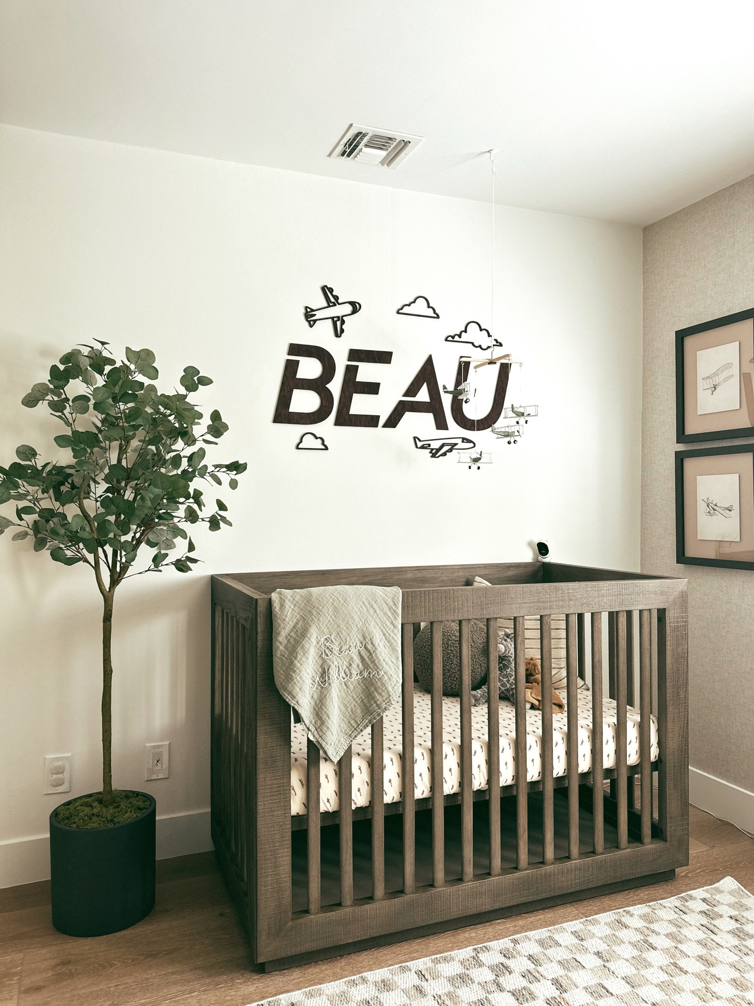 Another glimpse of our airplane nursery. We love how the Etsy name sign turned out. We also printed off these vintage airplane drawings and added an airplane mobile. 

#LTKFamily #LTKBump #LTKBaby