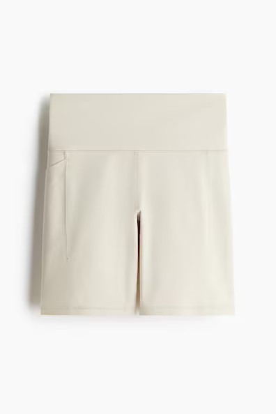 H & M - Pocket-detail sports cycling shorts with DryMove - Beige | H&M (UK, MY, IN, SG, PH, TW, HK)