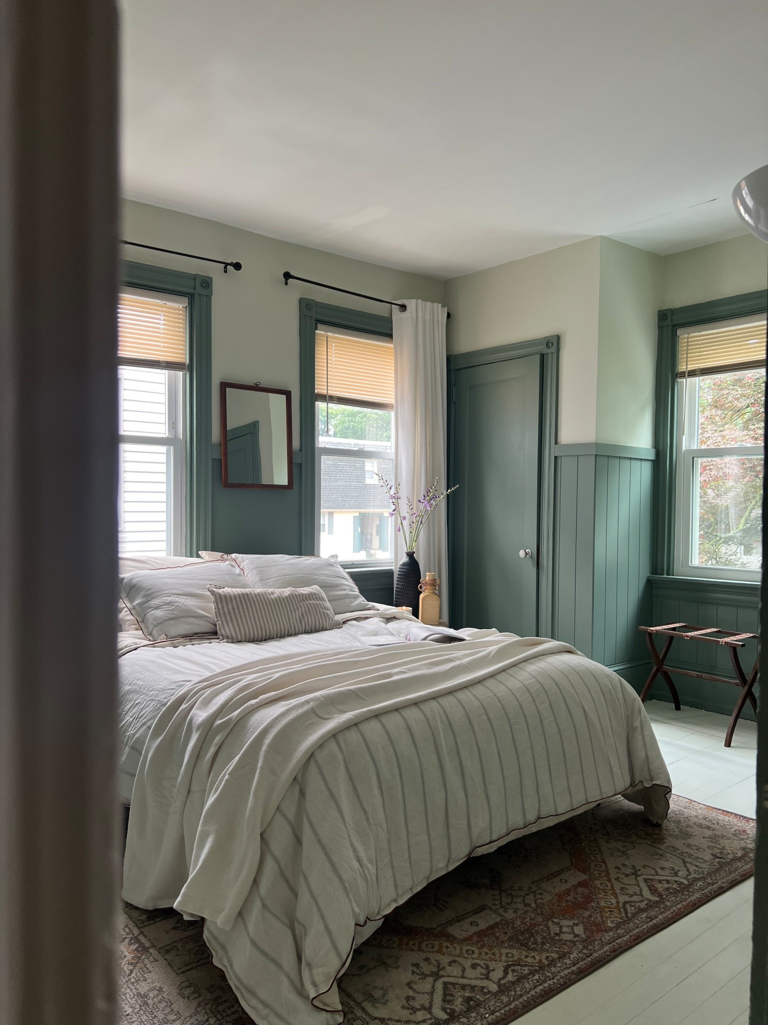 Cozy cottage vibes guest bedroom.  Striped bedding, natural textures, and practical styling. 

#LTKHome