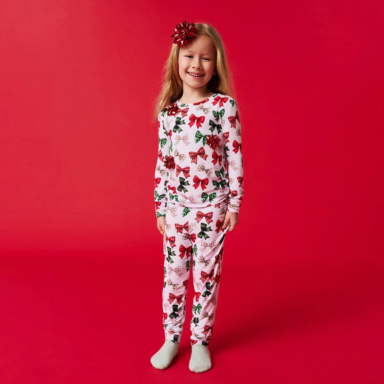 Holiday Bows White Long Sleeve Toddler Pajamas | Christabel | Posh Peanut