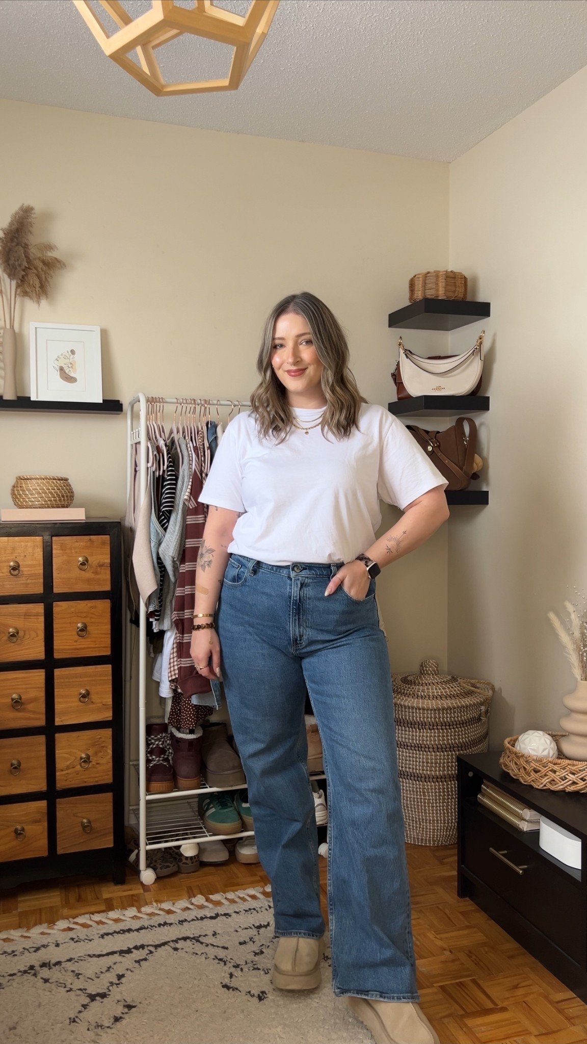 My all time fave jeans! Wearing 32, I probably could do a 31, but I prefer a looser fit! I’m 5’8 with shorter legs and a long torso, so I get regular length. They are comfy, flattering, and have the perfect amount of stretch! This white cotton tee is not see through and the high neck makes it perfect for layering, wearing my usual size L. Ugg tazz fit TTS, wearing 10


#LTKmidsize #LTKjeans #LTKsale